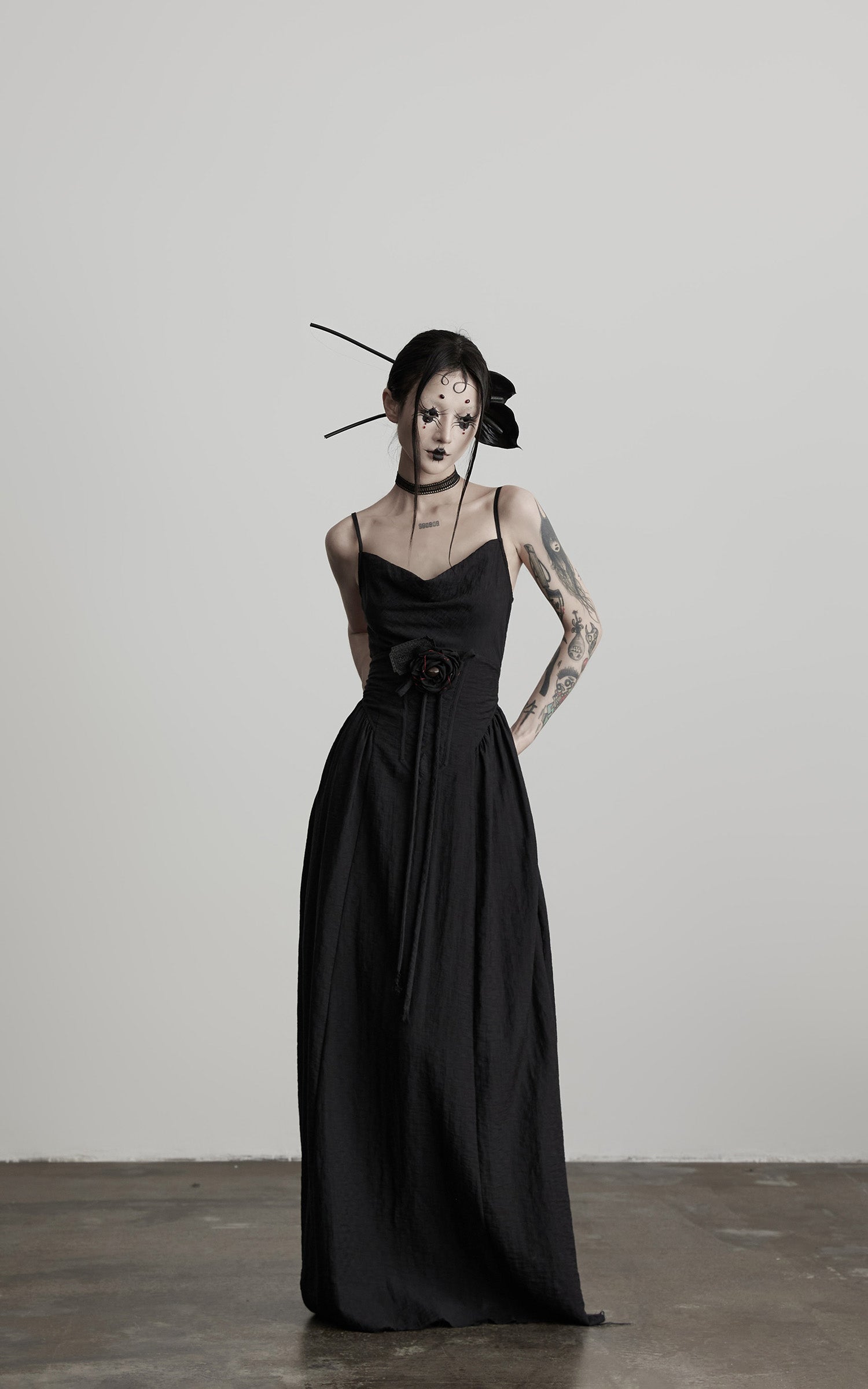 DOINDULGE Draped Maxi Dress with Corset Waist and Rosette Detail