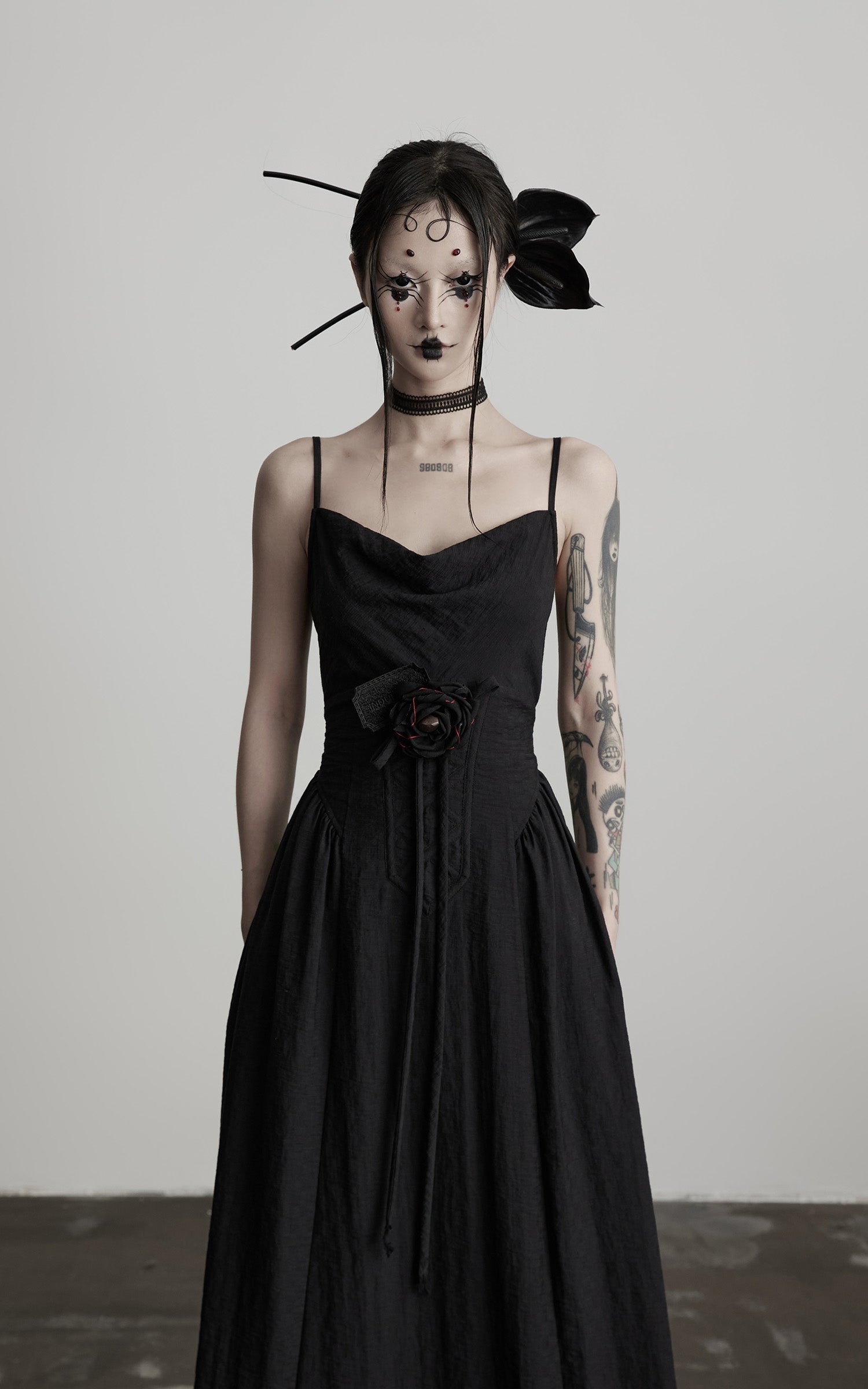DOINDULGE Draped Maxi Dress with Corset Waist and Rosette Detail
