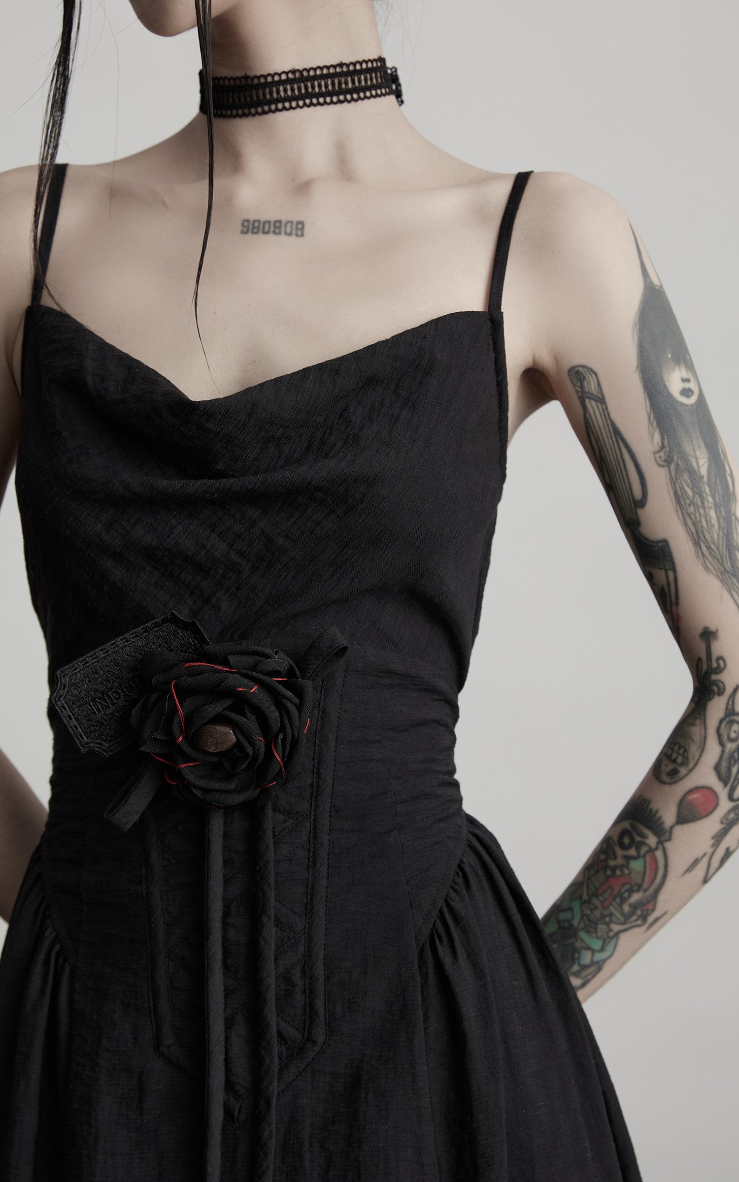 DOINDULGE Draped Maxi Dress with Corset Waist and Rosette Detail
