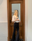 Rase le sol High-Waisted Stretch Flared Pants with Asymmetric Wrap Tie Detail - PINKPARKS