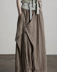 DOINDULGE Draped Asymmetric Wide-Leg Trousers in Textured Stripe