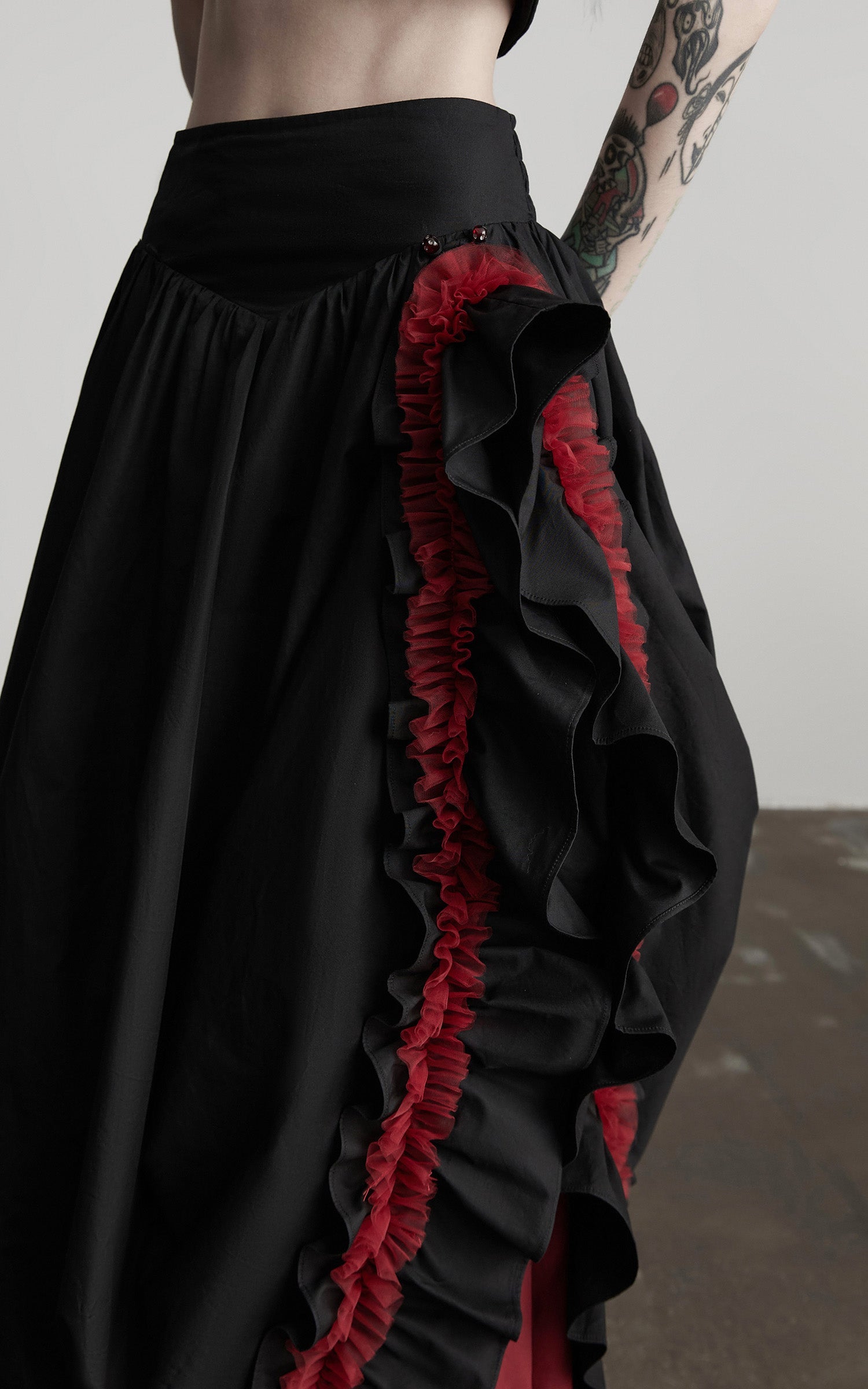 DOINDULGE Flared Skirt with Layered Frill Draping and Contrast Underskirt