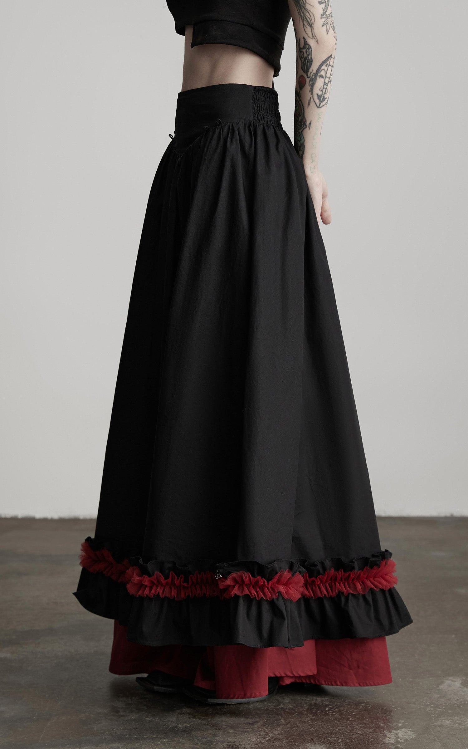 DOINDULGE Flared Skirt with Layered Frill Draping and Contrast Underskirt