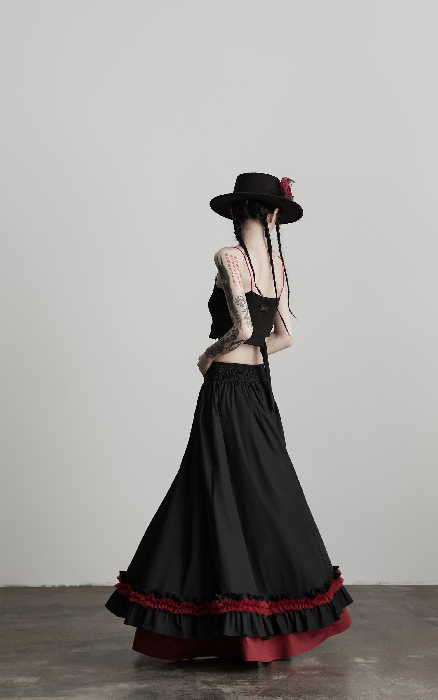 DOINDULGE Flared Skirt with Layered Frill Draping and Contrast Underskirt