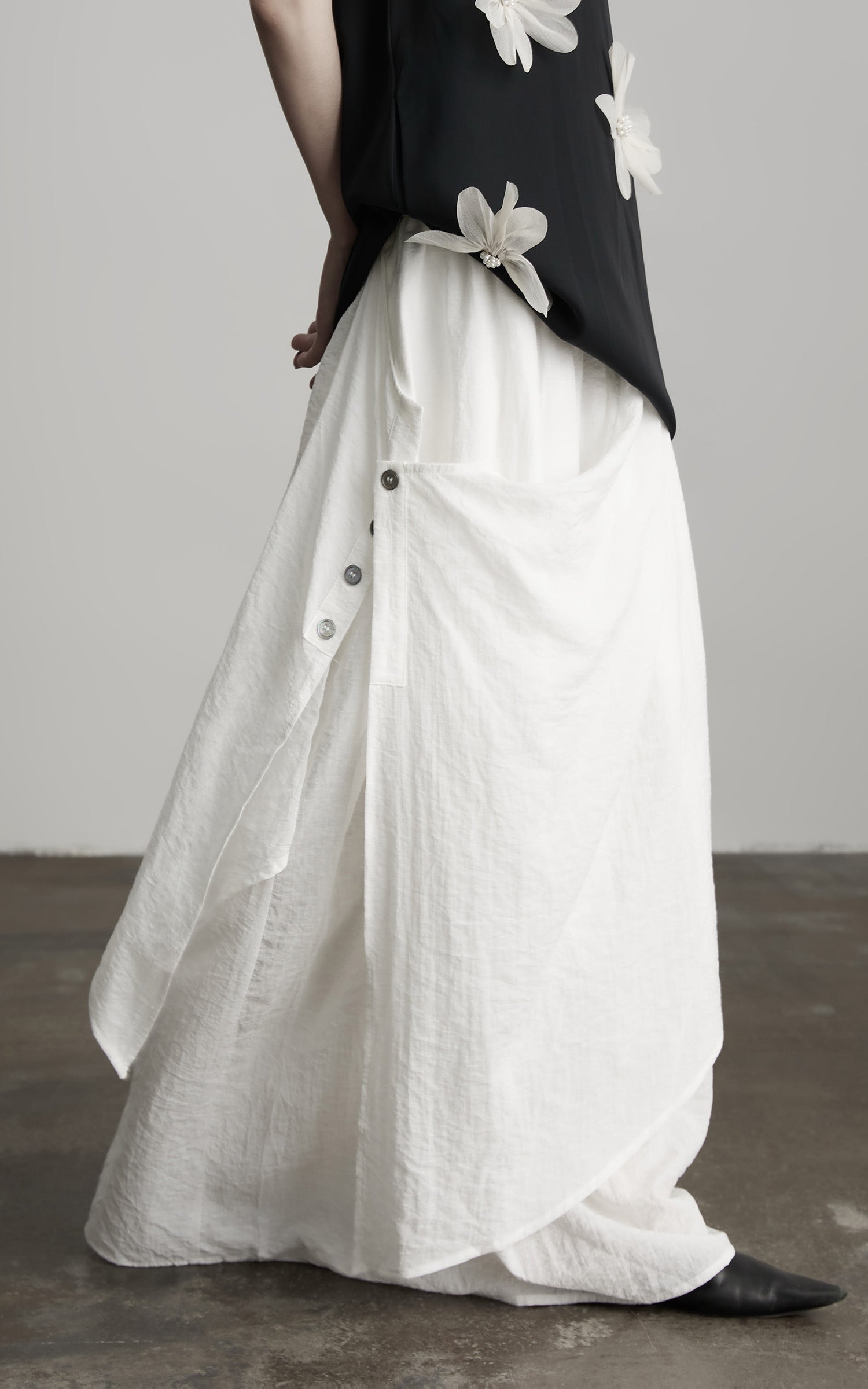 DOINDULGE Asymmetric Draped Skirt with Side Button Detail and Textured Cotton Layers