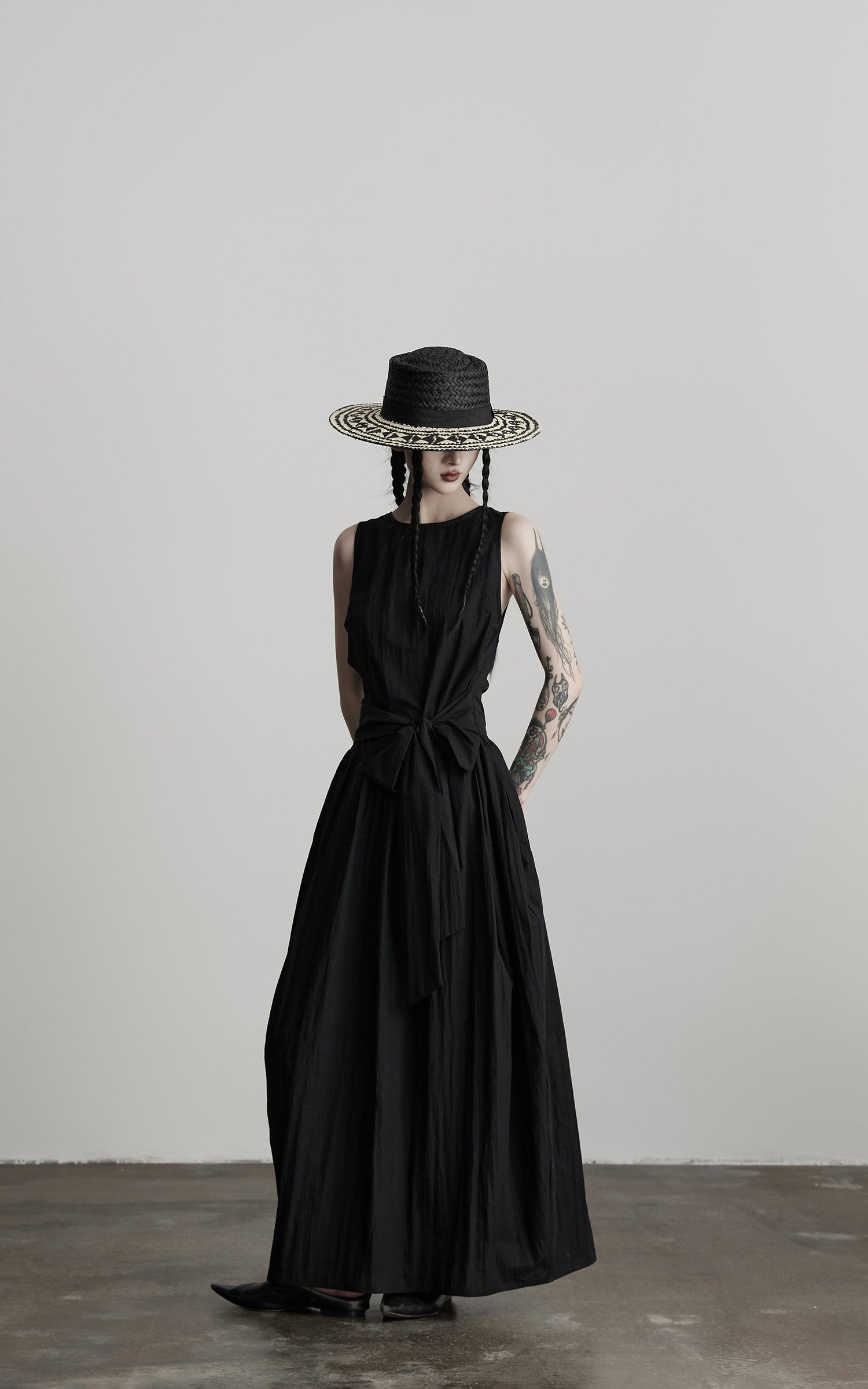 DOINDULGE Sleeveless Draped Maxi Dress with Hand-Tied Bead Embellishment and Sculpted Waist
