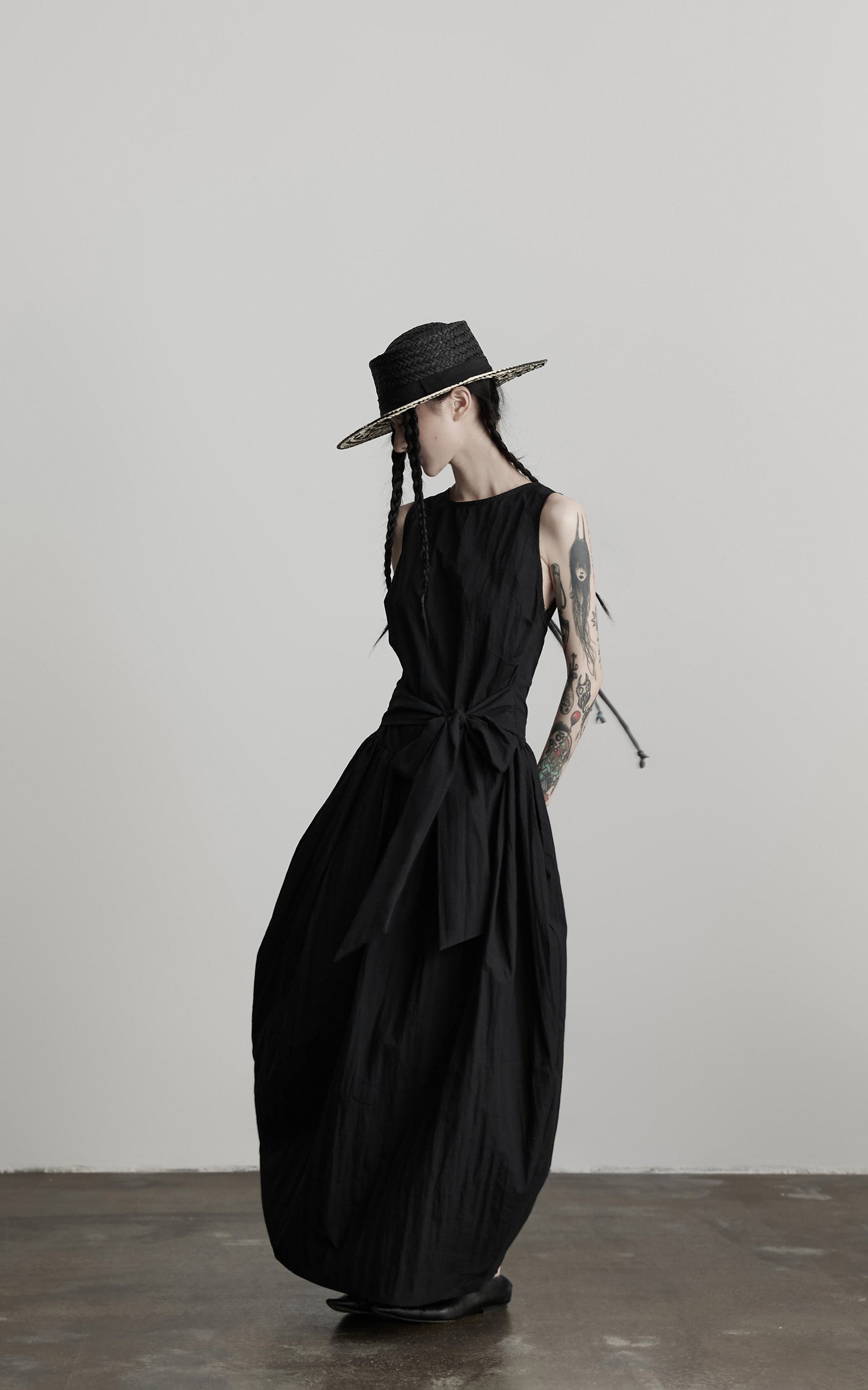 DOINDULGE Sleeveless Draped Maxi Dress with Hand-Tied Bead Embellishment and Sculpted Waist