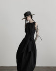 DOINDULGE Sleeveless Draped Maxi Dress with Hand-Tied Bead Embellishment and Sculpted Waist