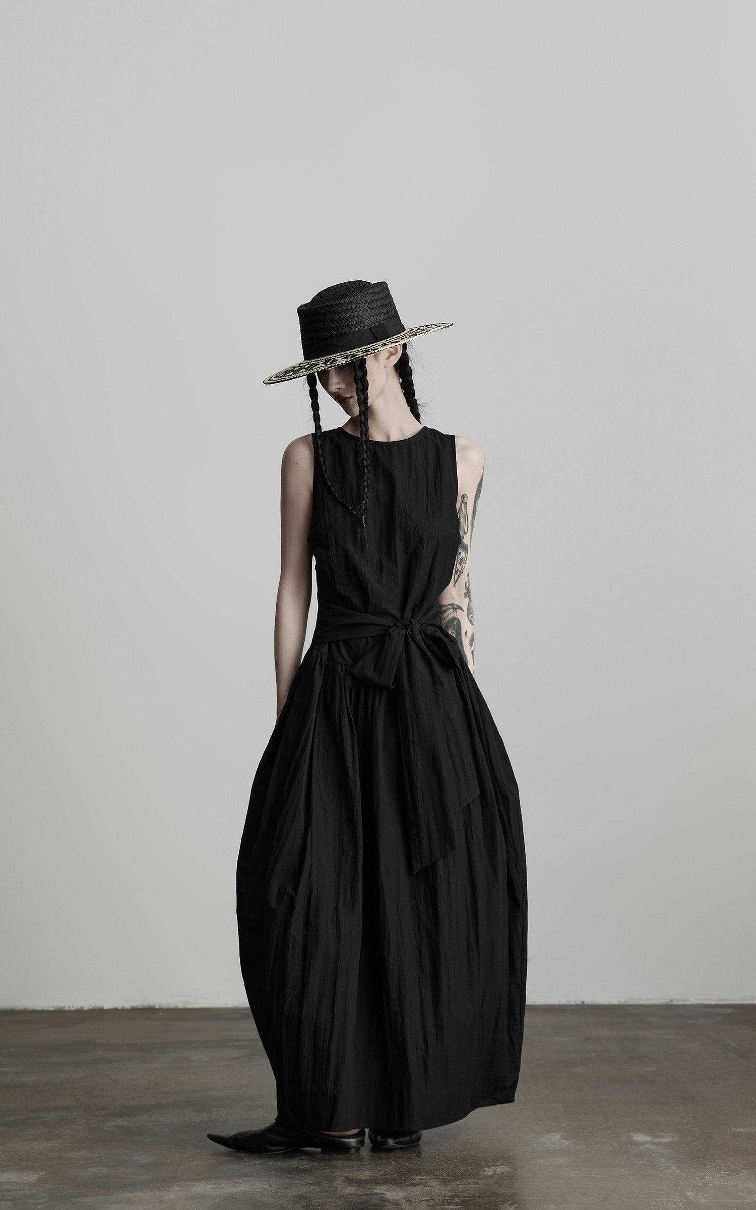 DOINDULGE Sleeveless Draped Maxi Dress with Hand-Tied Bead Embellishment and Sculpted Waist