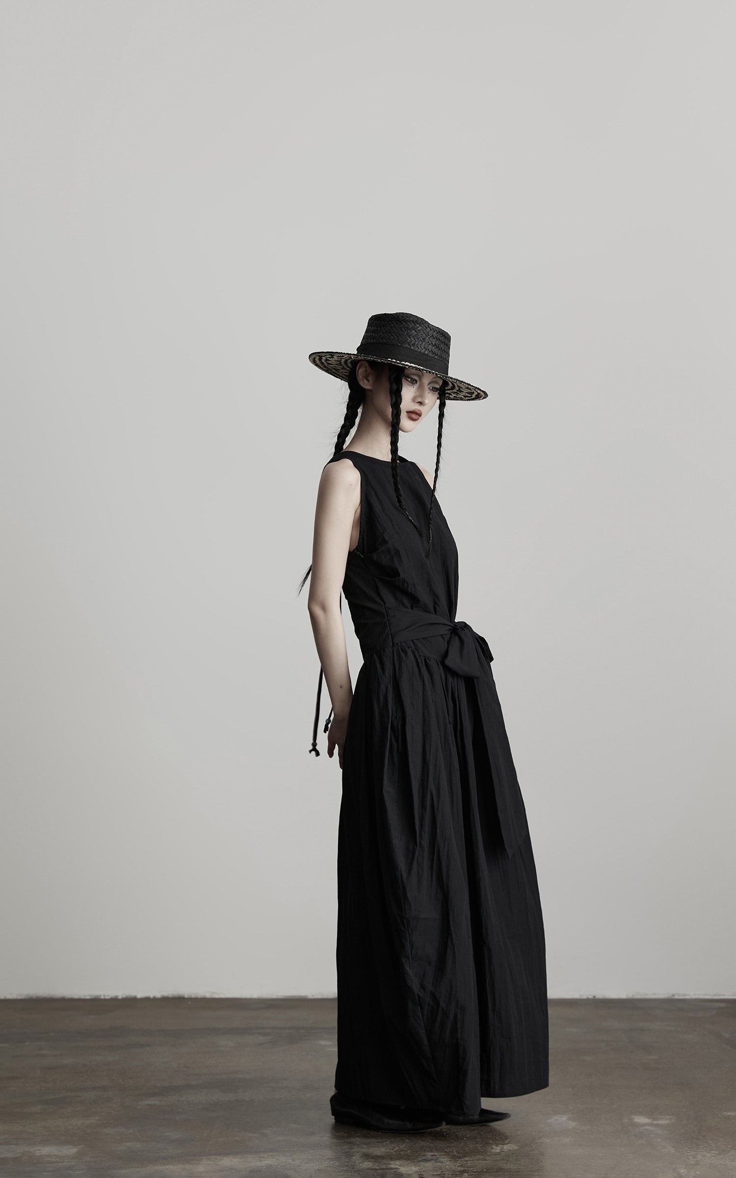 DOINDULGE Sleeveless Draped Maxi Dress with Hand-Tied Bead Embellishment and Sculpted Waist