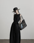 DOINDULGE Sleeveless Draped Maxi Dress with Hand-Tied Bead Embellishment and Sculpted Waist