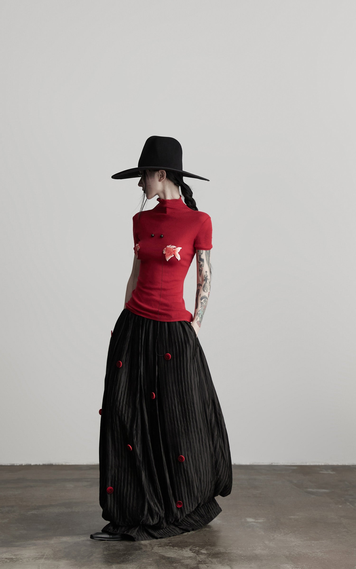 DOINDULGE Black Pleated Skirt Red Button Accents