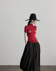 DOINDULGE Black Pleated Skirt Red Button Accents