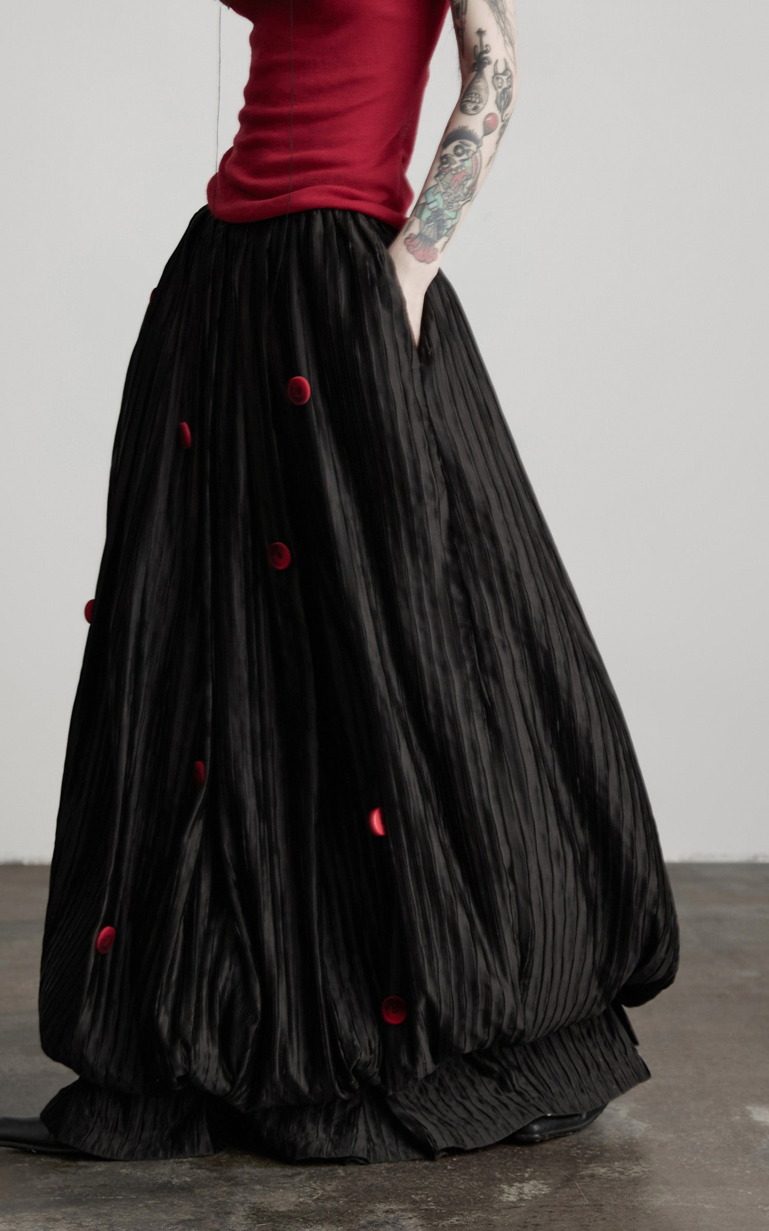 DOINDULGE Black Pleated Skirt Red Button Accents