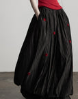 DOINDULGE Black Pleated Skirt Red Button Accents