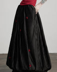 DOINDULGE Black Pleated Skirt Red Button Accents