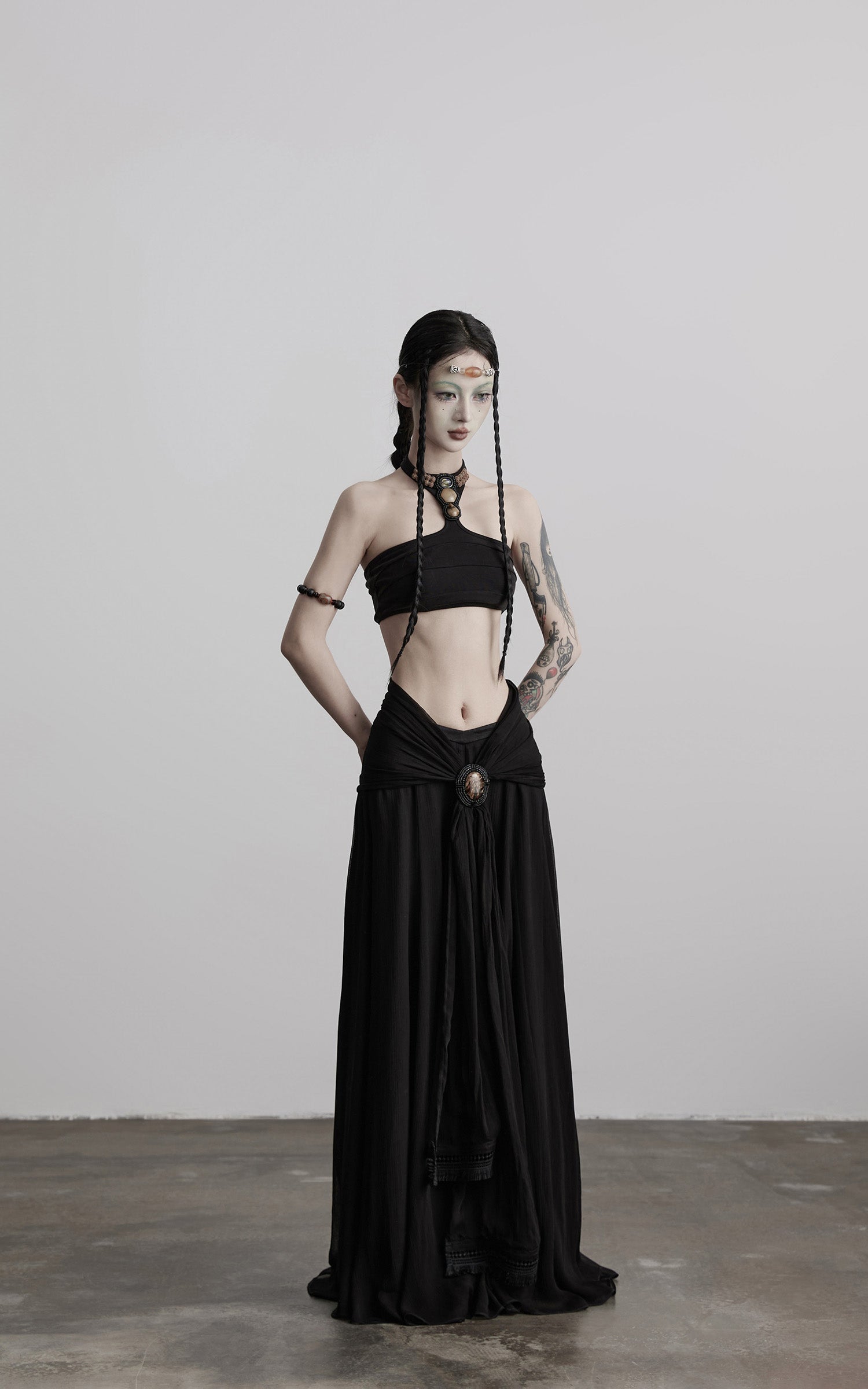 DOINDULGE Draped Maxi Skirt with Medallion