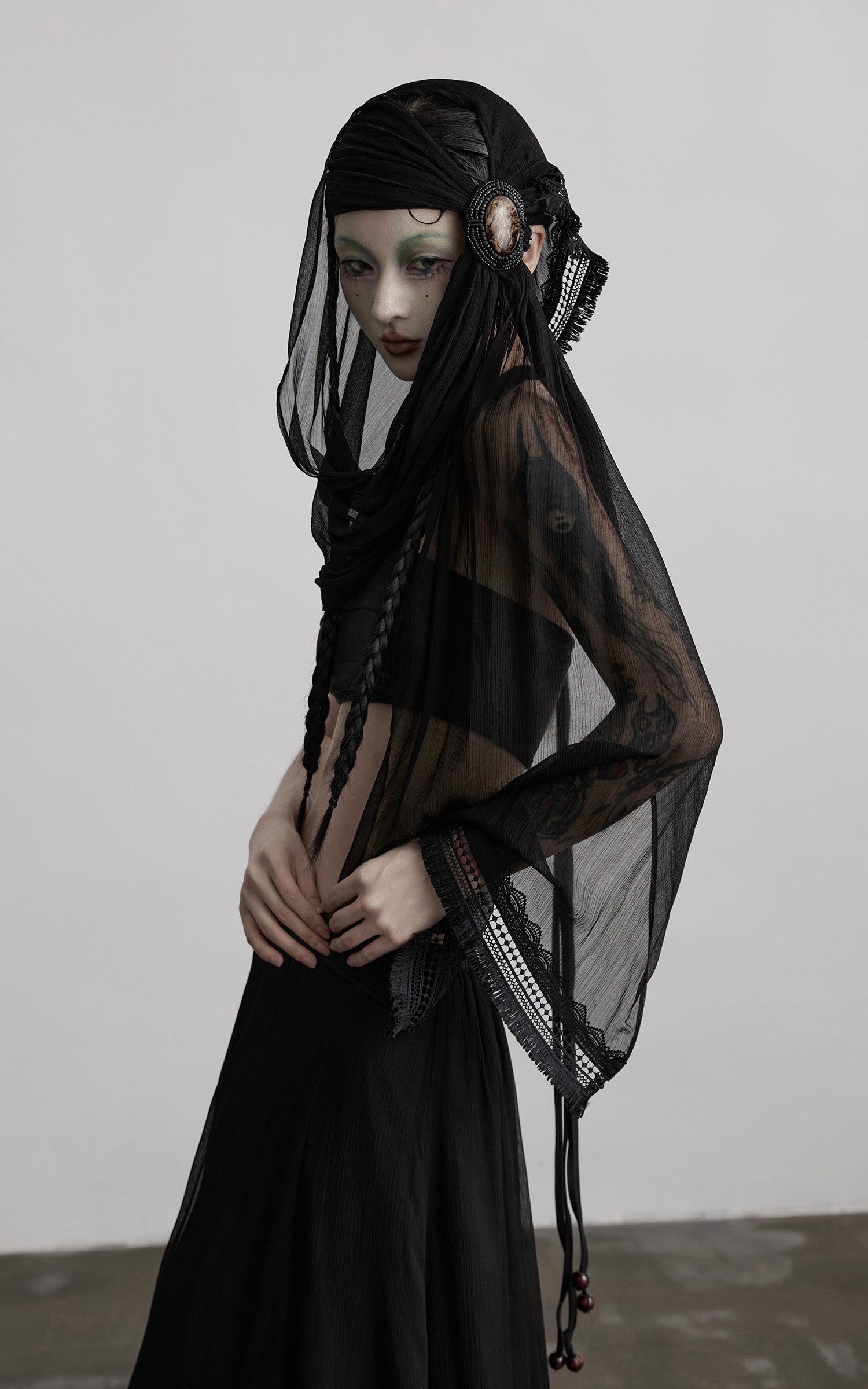 DOINDULGE Draped Maxi Skirt with Medallion