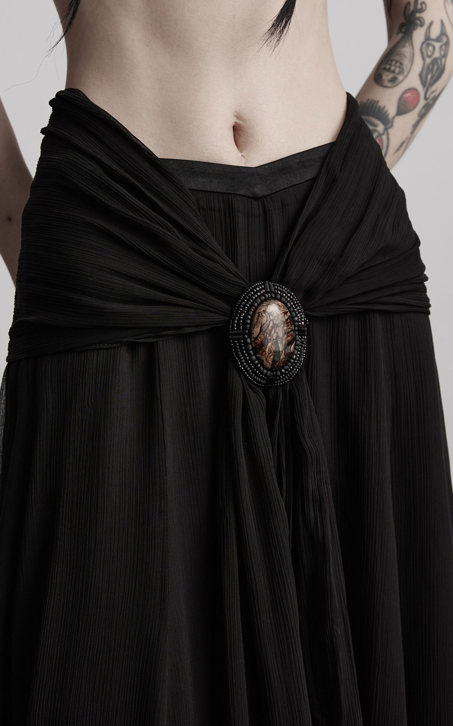 DOINDULGE Draped Maxi Skirt with Medallion