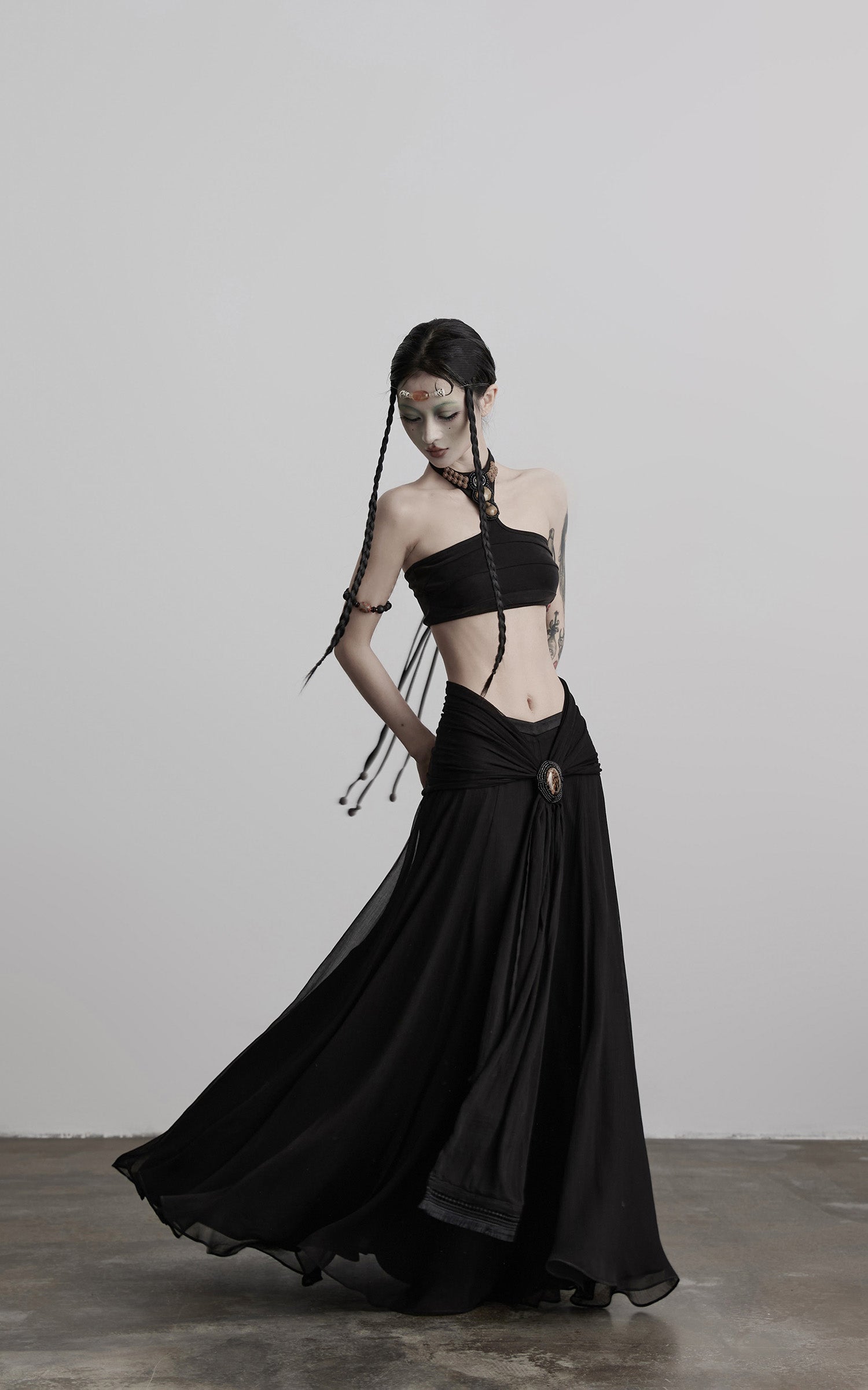DOINDULGE Draped Maxi Skirt with Medallion