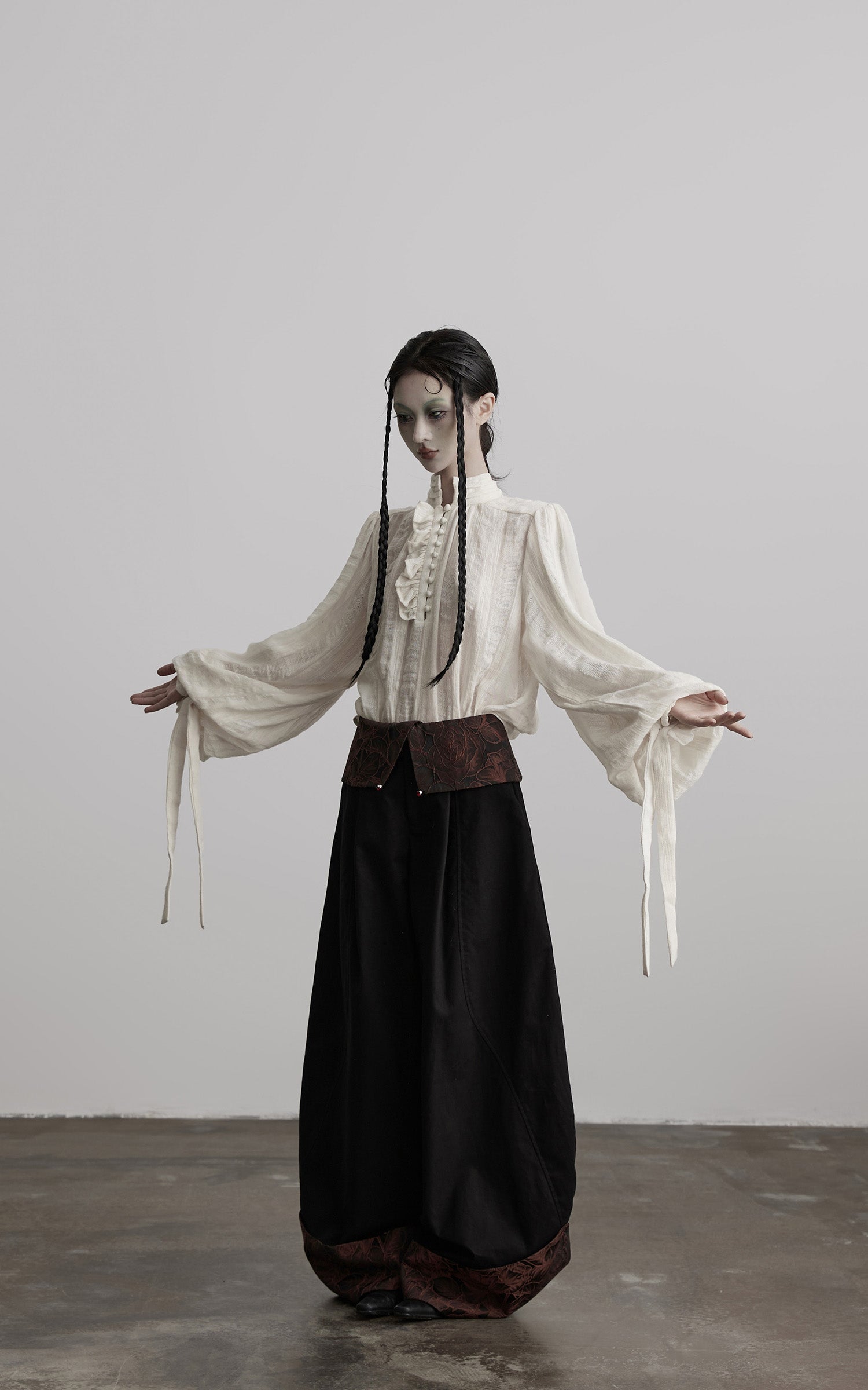DOINDULGE Wide-Legged High-Waisted Pants with Leaf-Pattern Detail