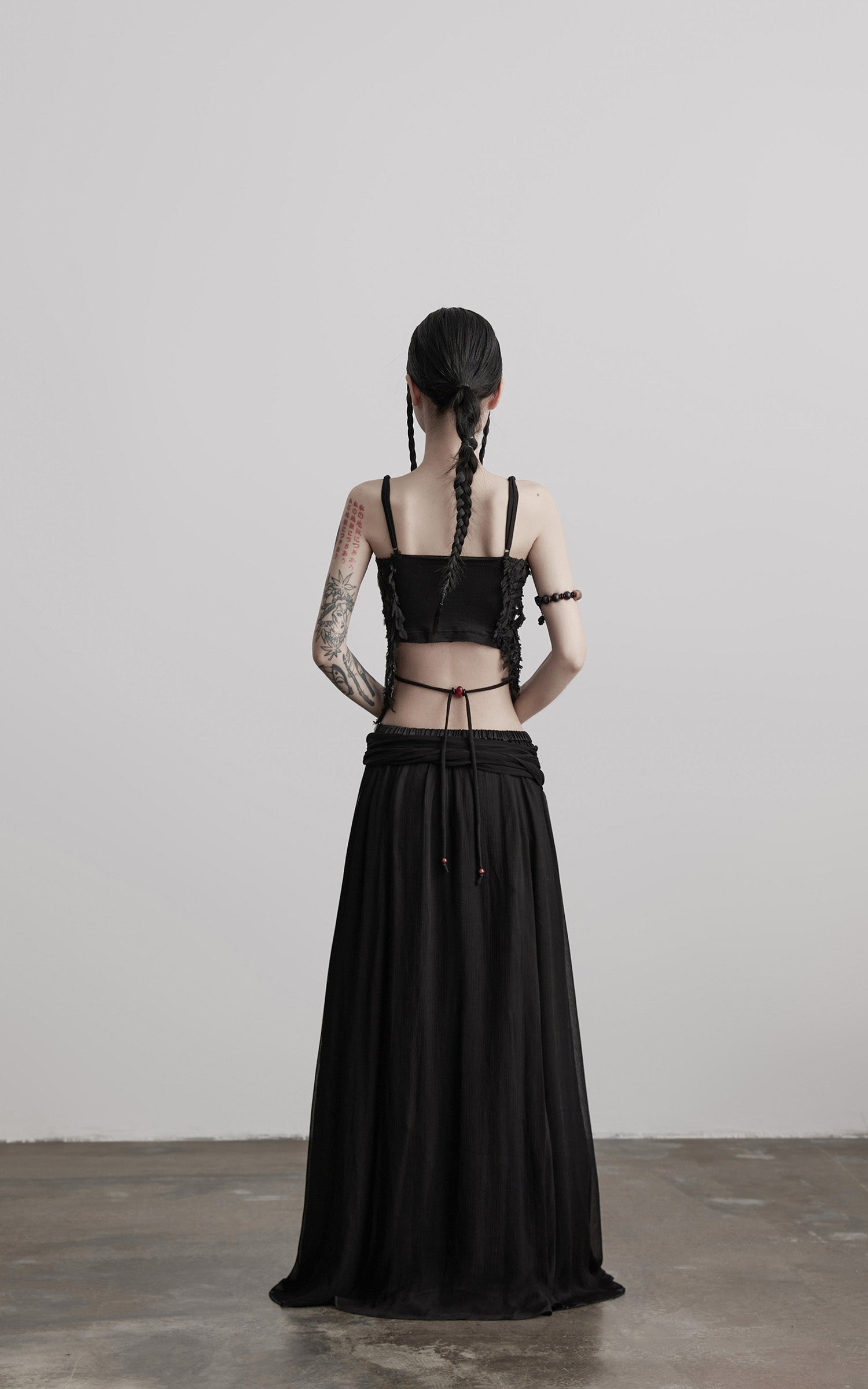 DOINDULGE Draped Maxi Skirt with Medallion