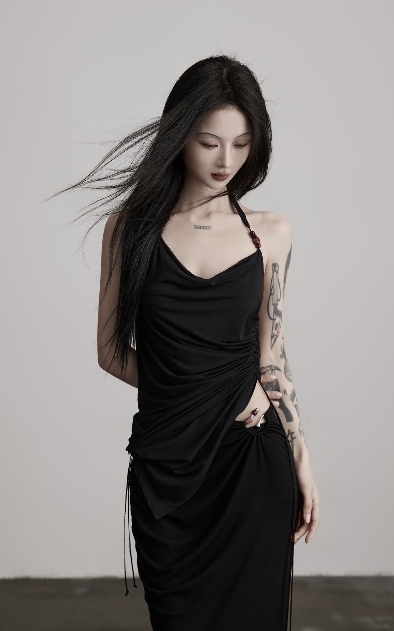 DOINDULGE Draped Halter Tank with Bead Detail and Asymmetric Ruched Cut-Out