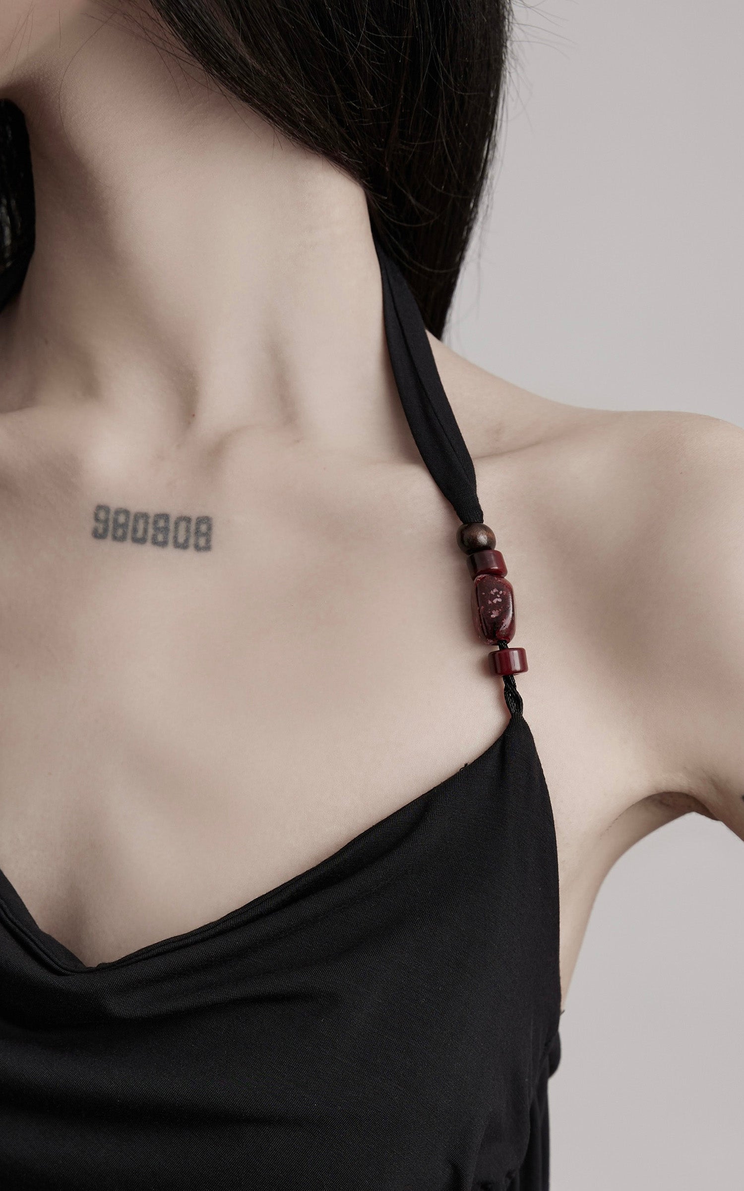 DOINDULGE Draped Halter Tank with Bead Detail and Asymmetric Ruched Cut-Out