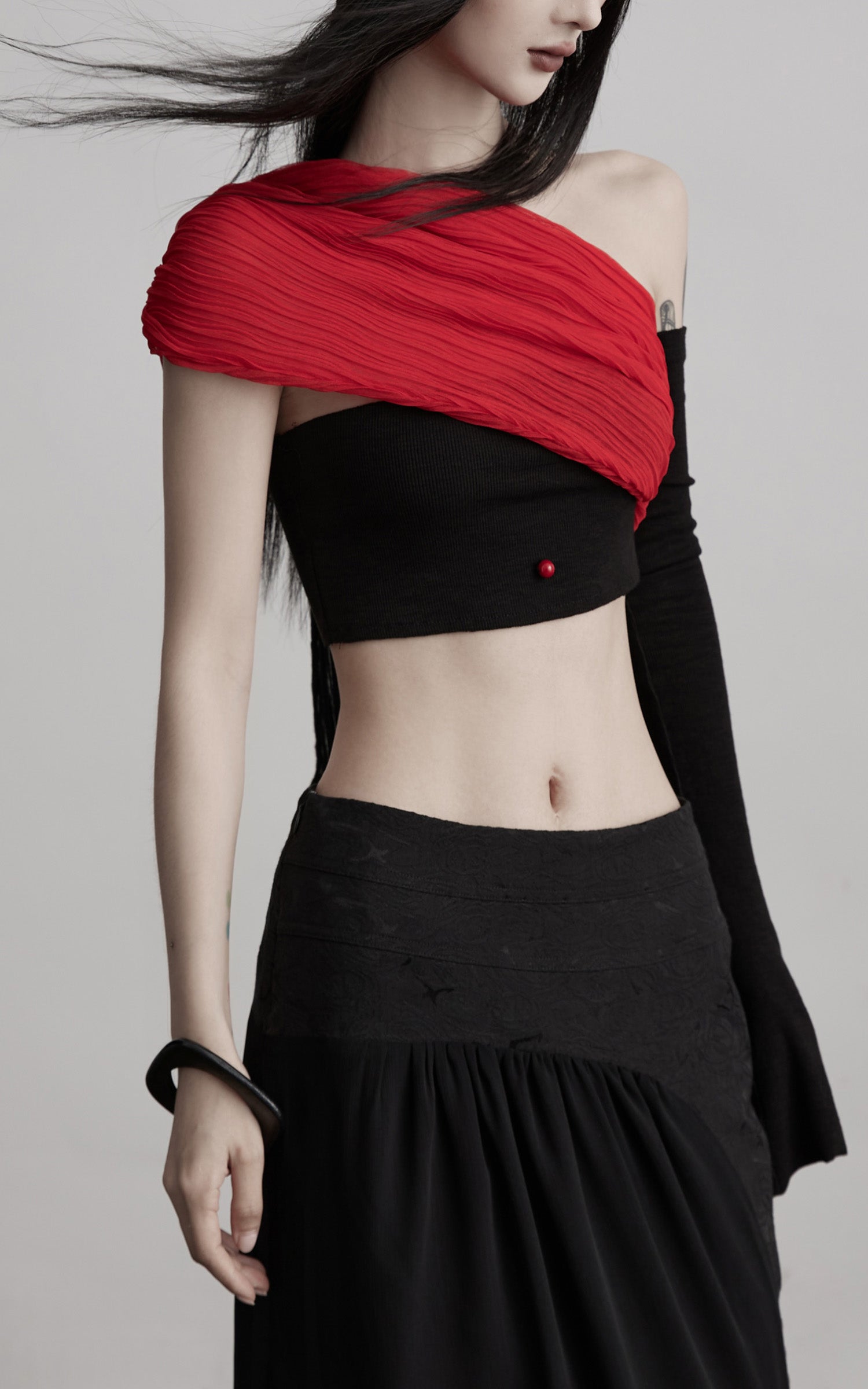 DOINDULGE Asymmetric Drape Top — Sculptural Red Pleats with Black Knit Base