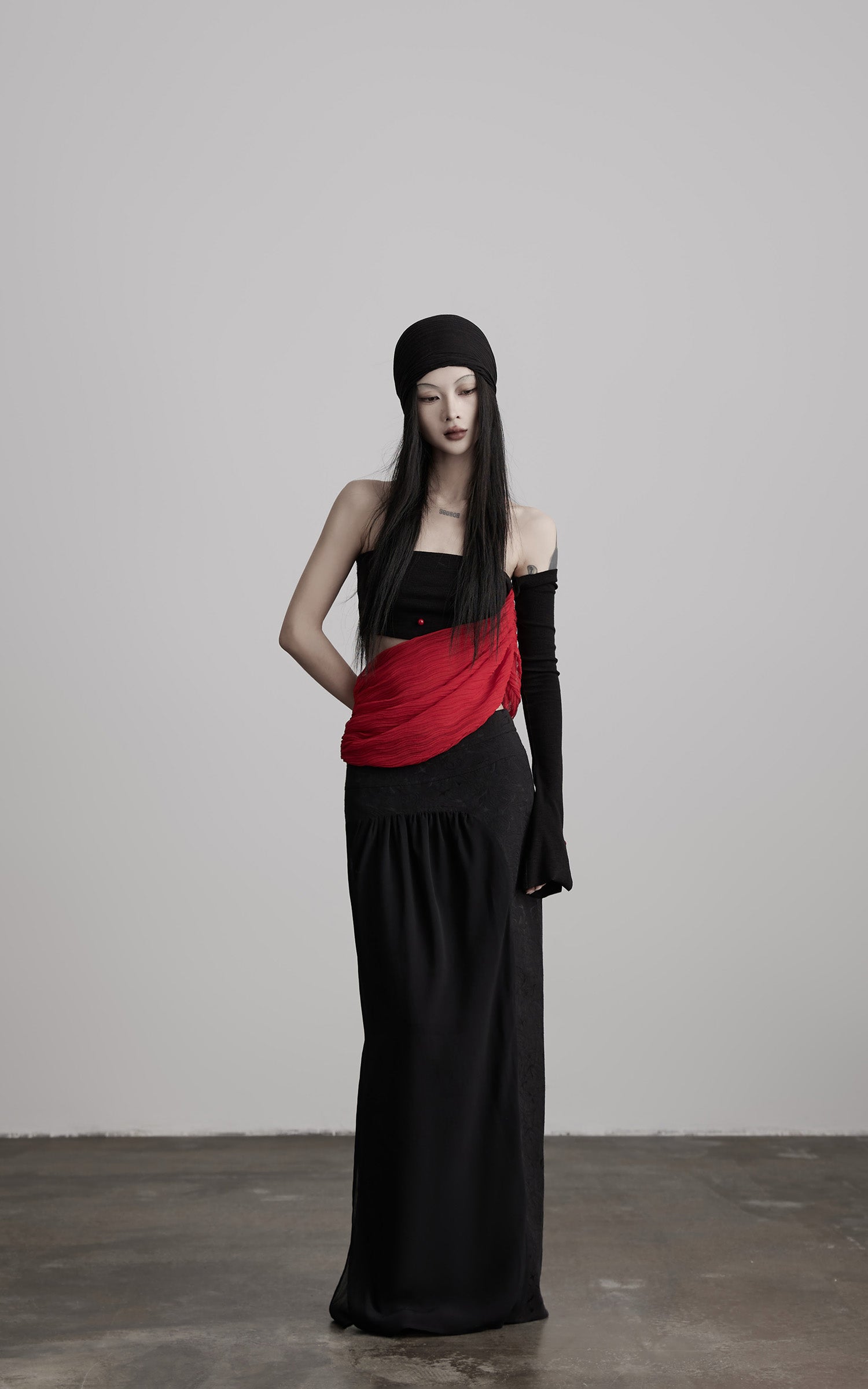 DOINDULGE Asymmetric Drape Top — Sculptural Red Pleats with Black Knit Base