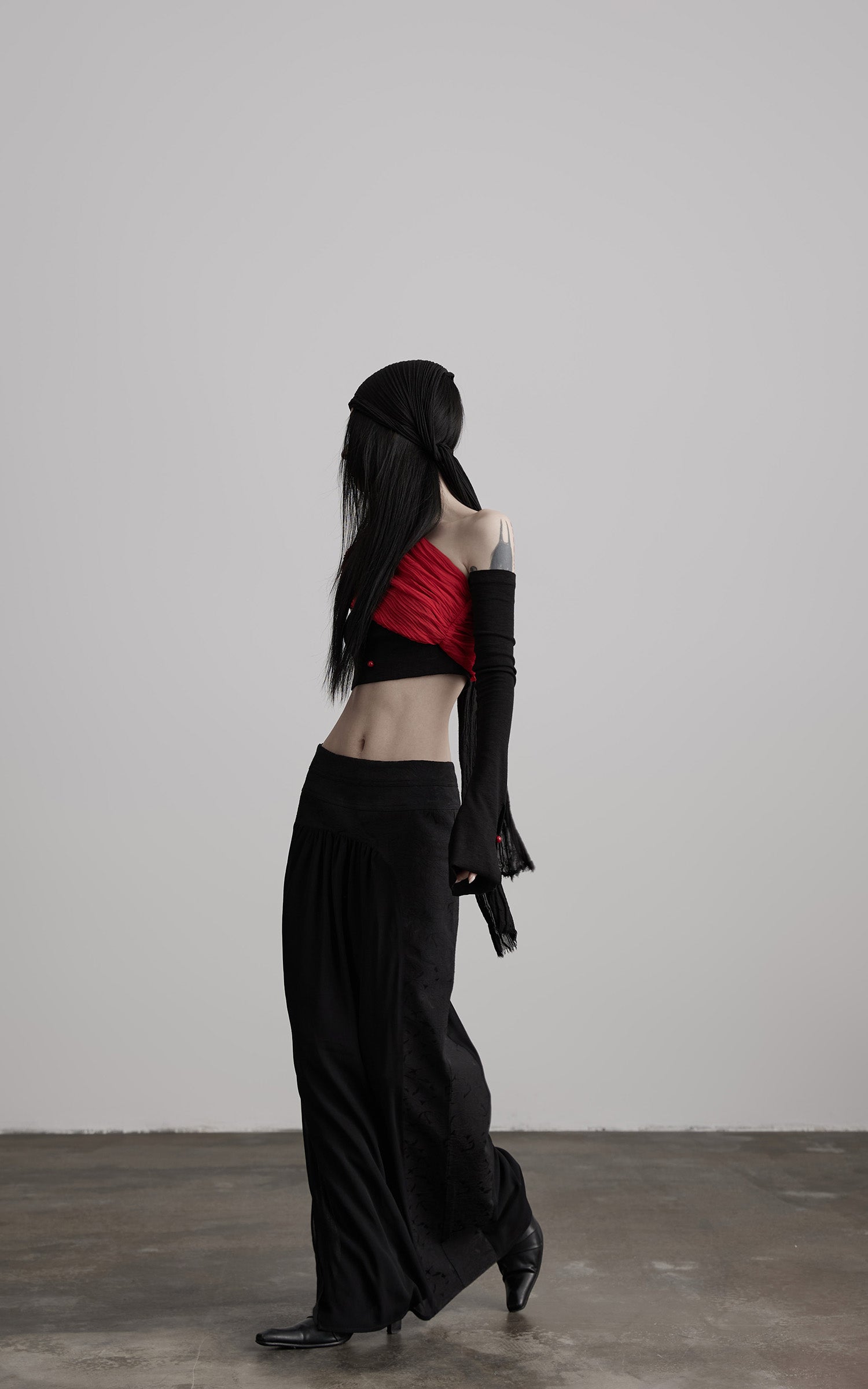DOINDULGE Asymmetric Drape Top — Sculptural Red Pleats with Black Knit Base