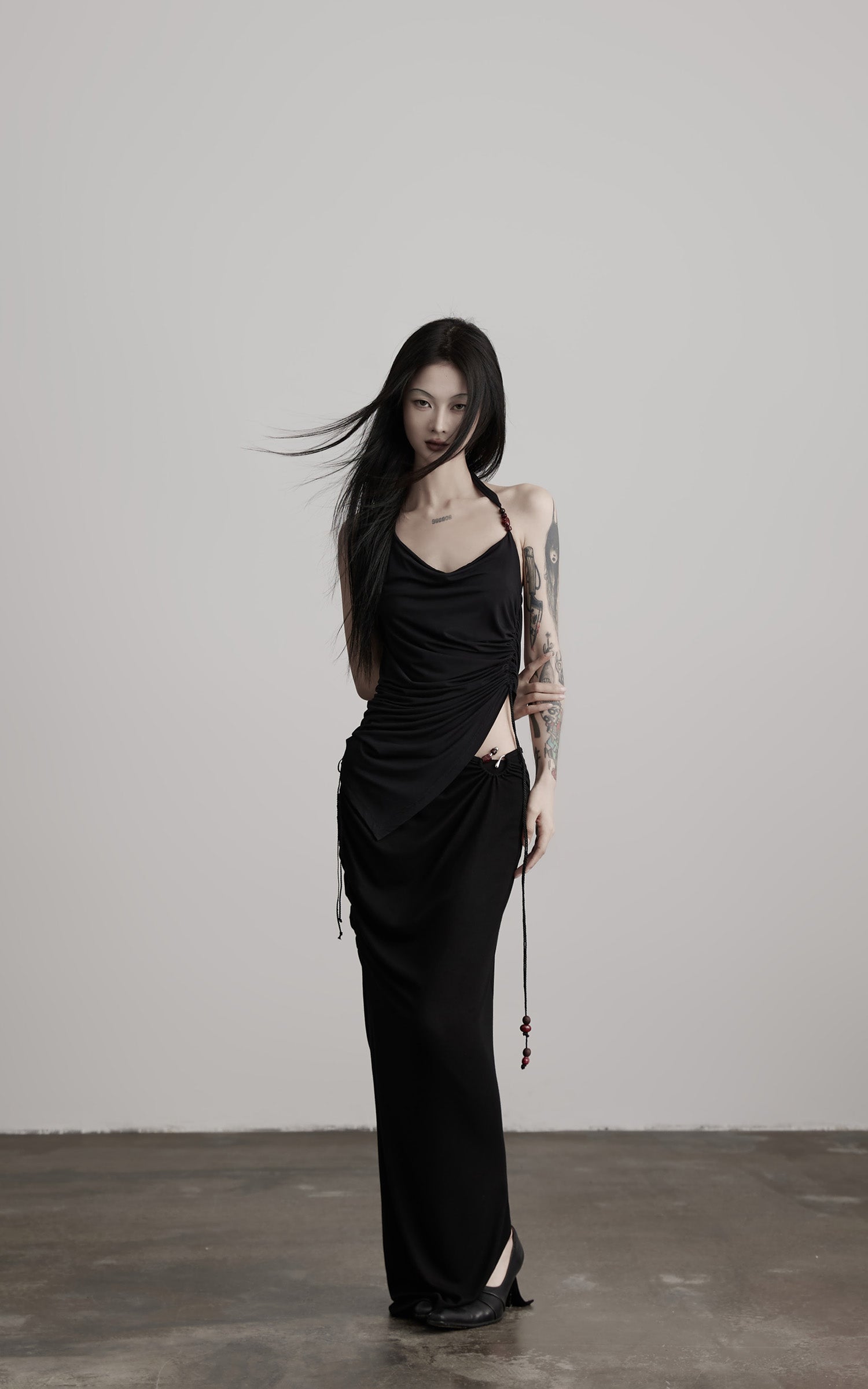 DOINDULGE Draped Halter Tank with Bead Detail and Asymmetric Ruched Cut-Out
