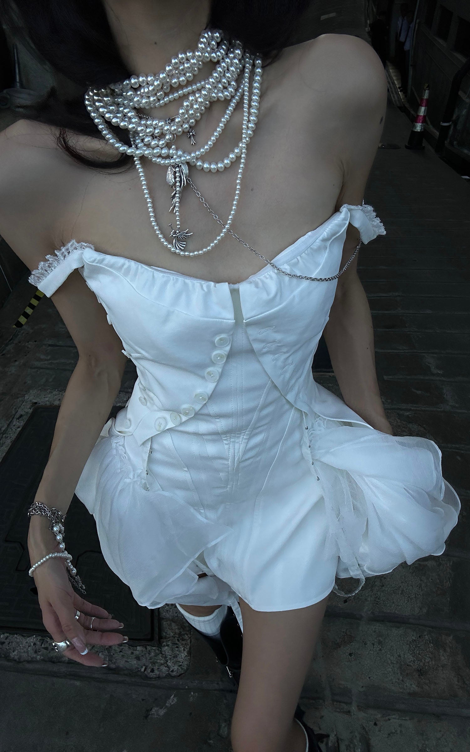 WARDEN EDGE Asymmetric Ruffled Mini Dress with Corset Detailing and Off-Shoulder Straps