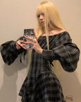 Robe corset à carreaux avec manches bouffantes et taille cintrée