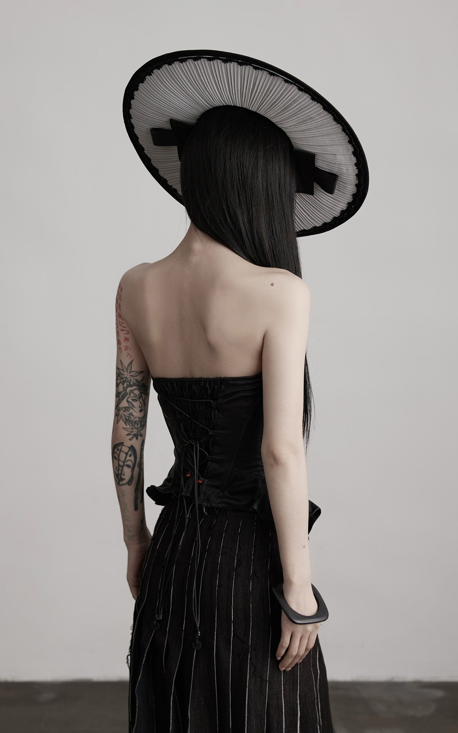 DOINDULGE Leather Corset Tube Top Convertible into Statement Hat