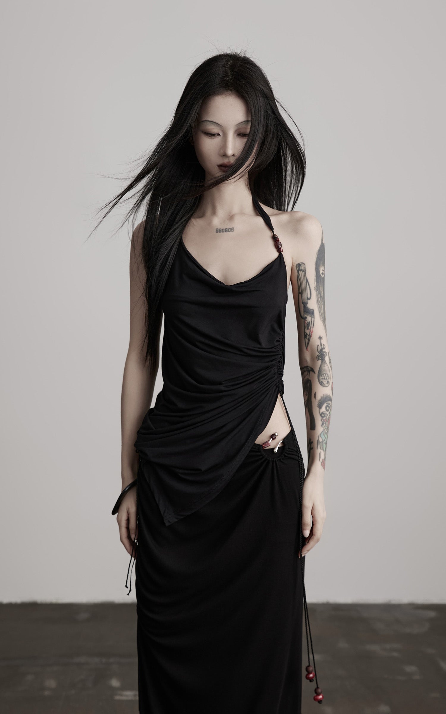 DOINDULGE Draped Halter Tank with Bead Detail and Asymmetric Ruched Cut-Out
