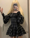 Robe corset à carreaux avec manches bouffantes et taille cintrée