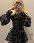 Robe corset à carreaux avec manches bouffantes et taille cintrée
