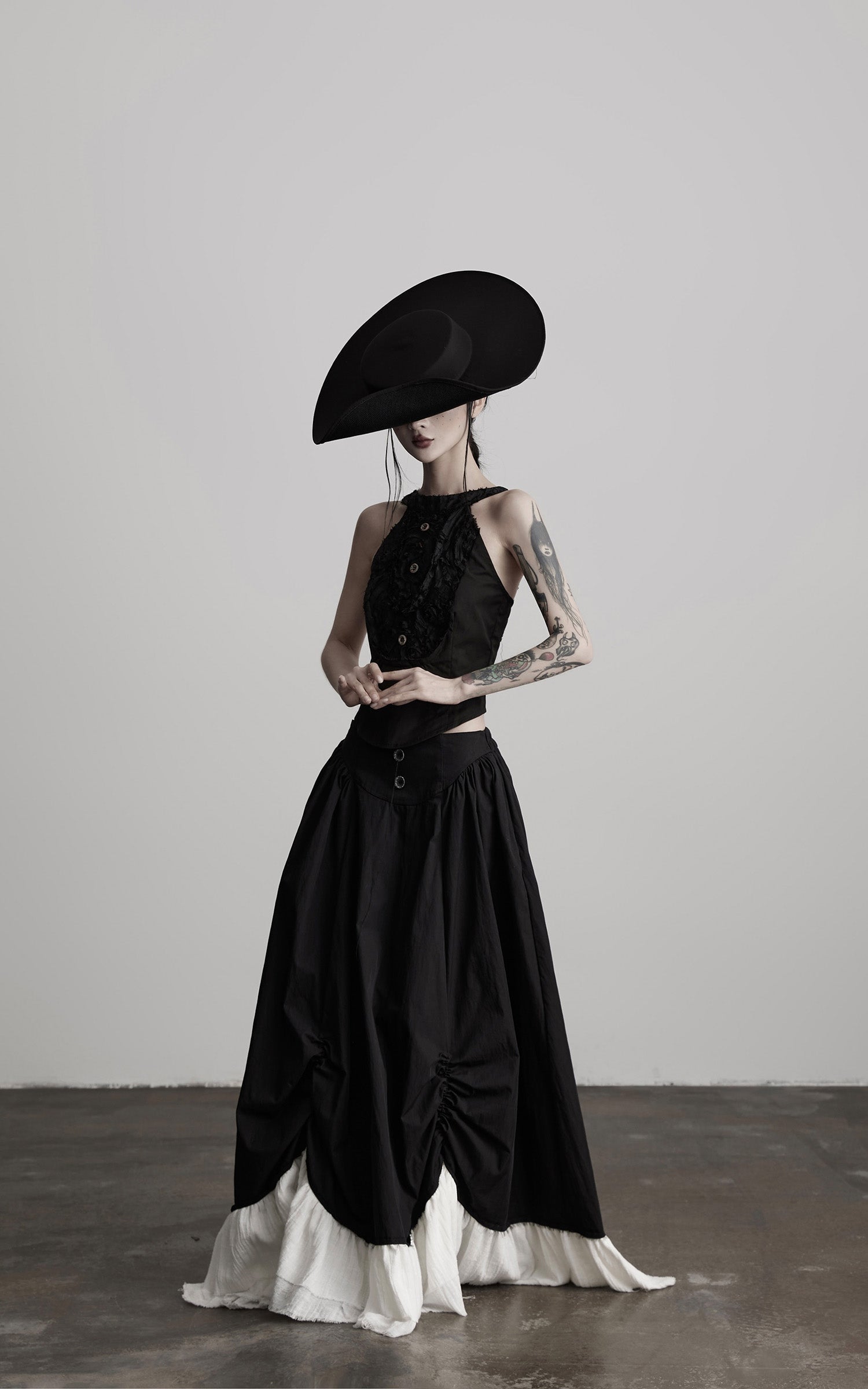 DOINDULGE Layered Contrast Hem Skirt with Gathered Draping and Buttoned High Waist