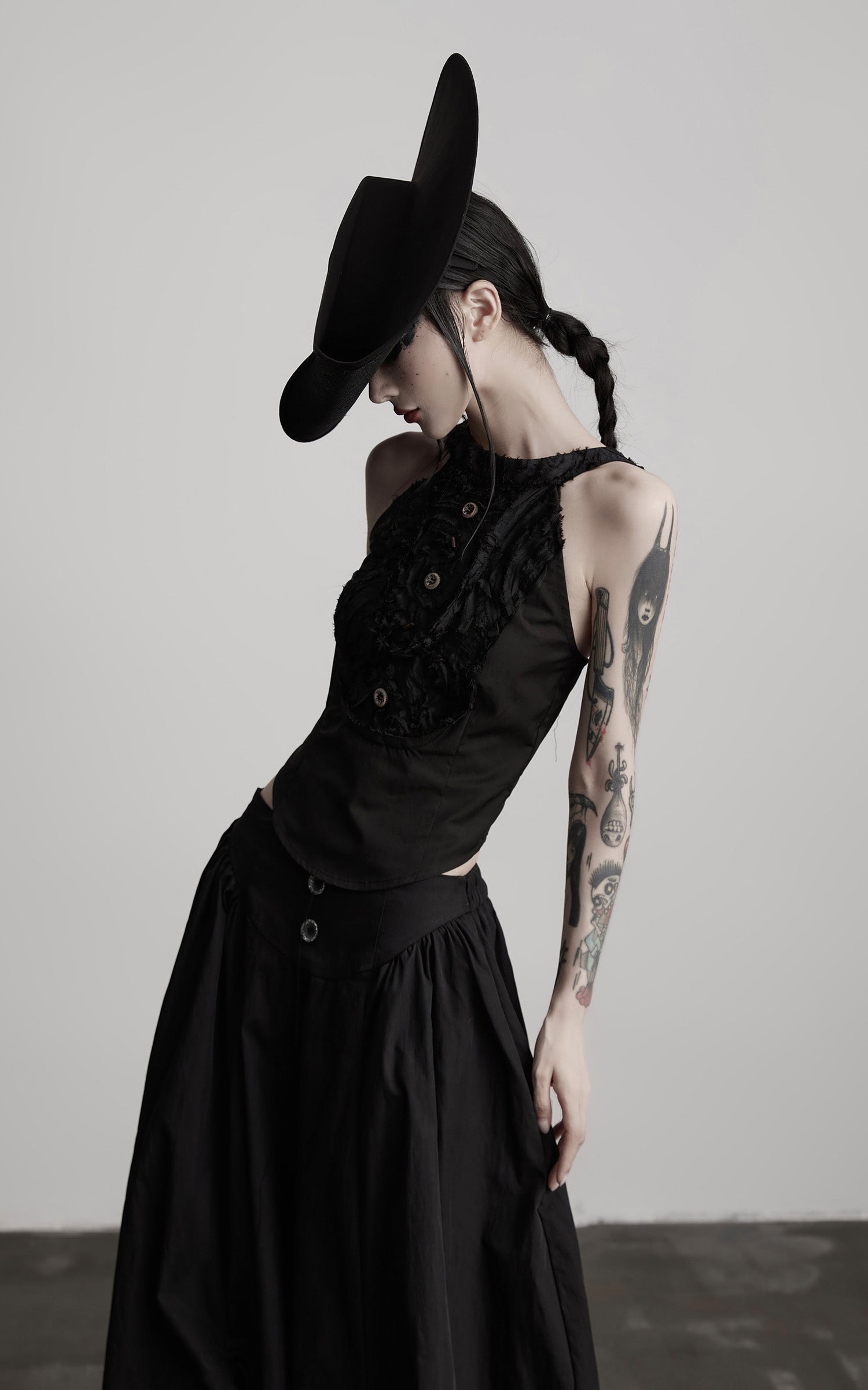 DOINDULGE Distressed Textured Halter Top with Sculptural Button Detail