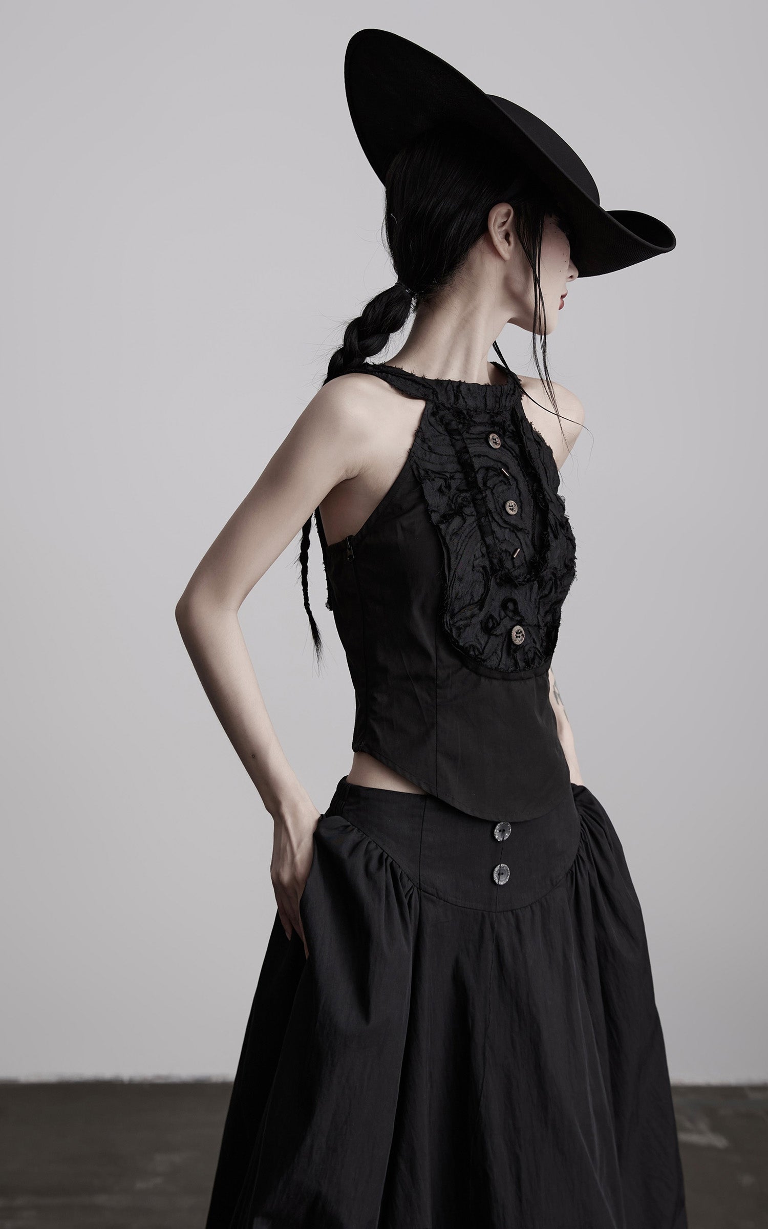 DOINDULGE Distressed Textured Halter Top with Sculptural Button Detail
