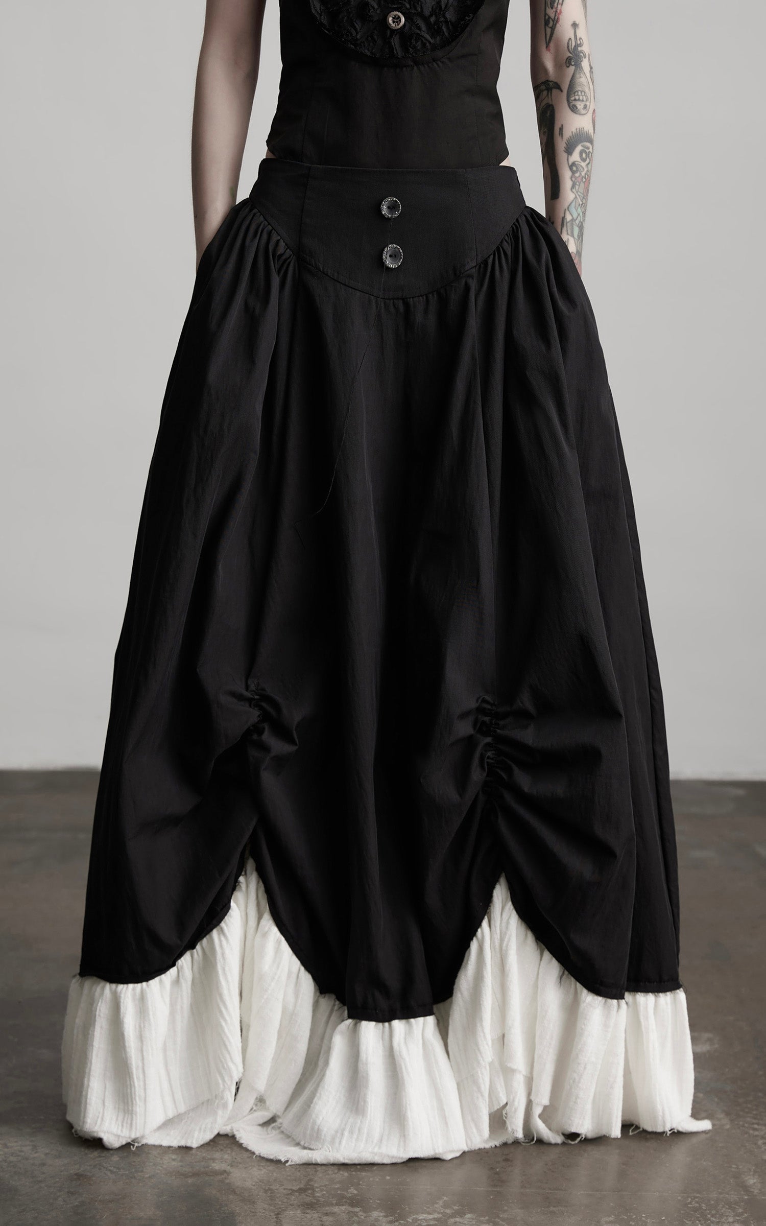 DOINDULGE Layered Contrast Hem Skirt with Gathered Draping and Buttoned High Waist