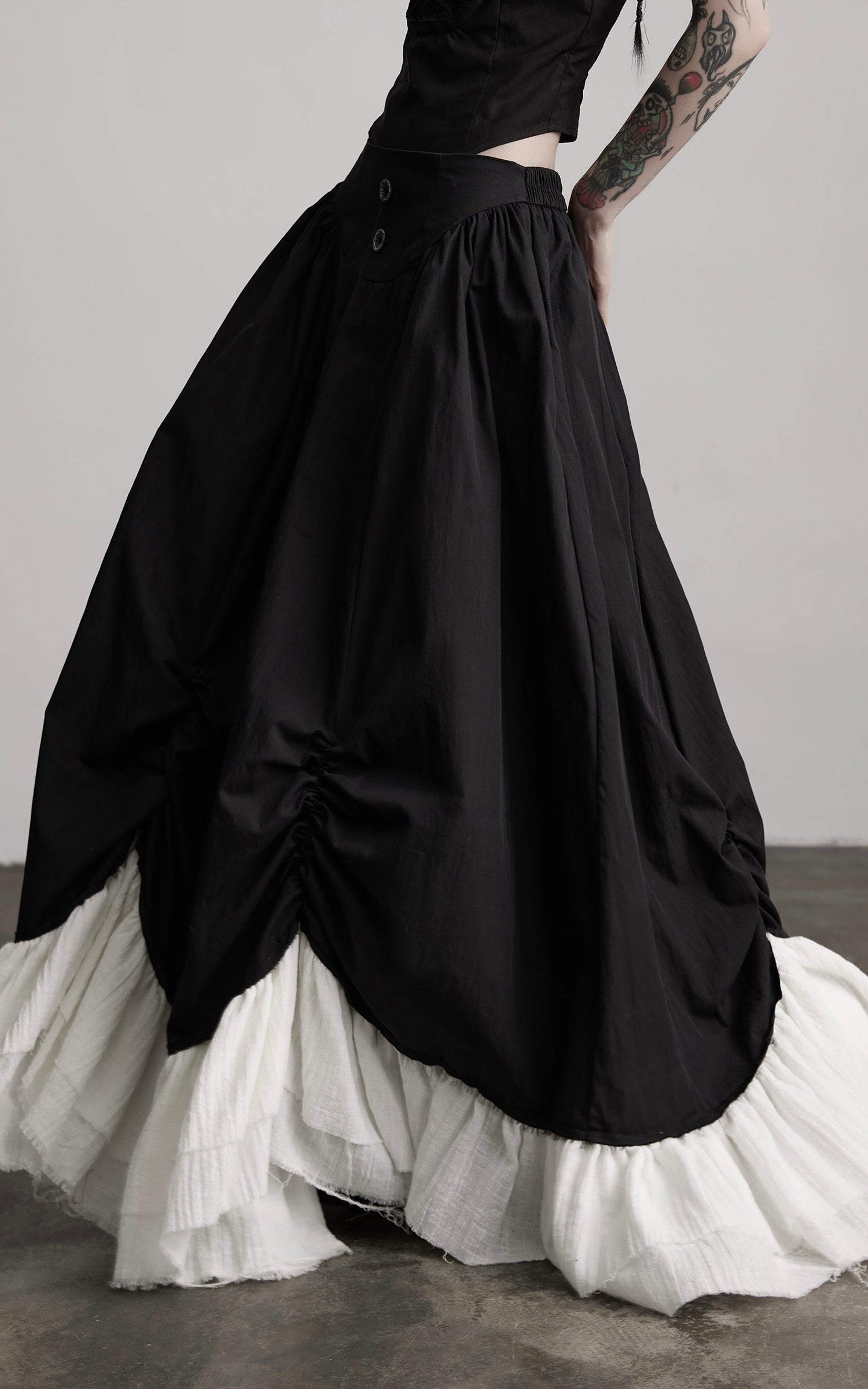 DOINDULGE Layered Contrast Hem Skirt with Gathered Draping and Buttoned High Waist