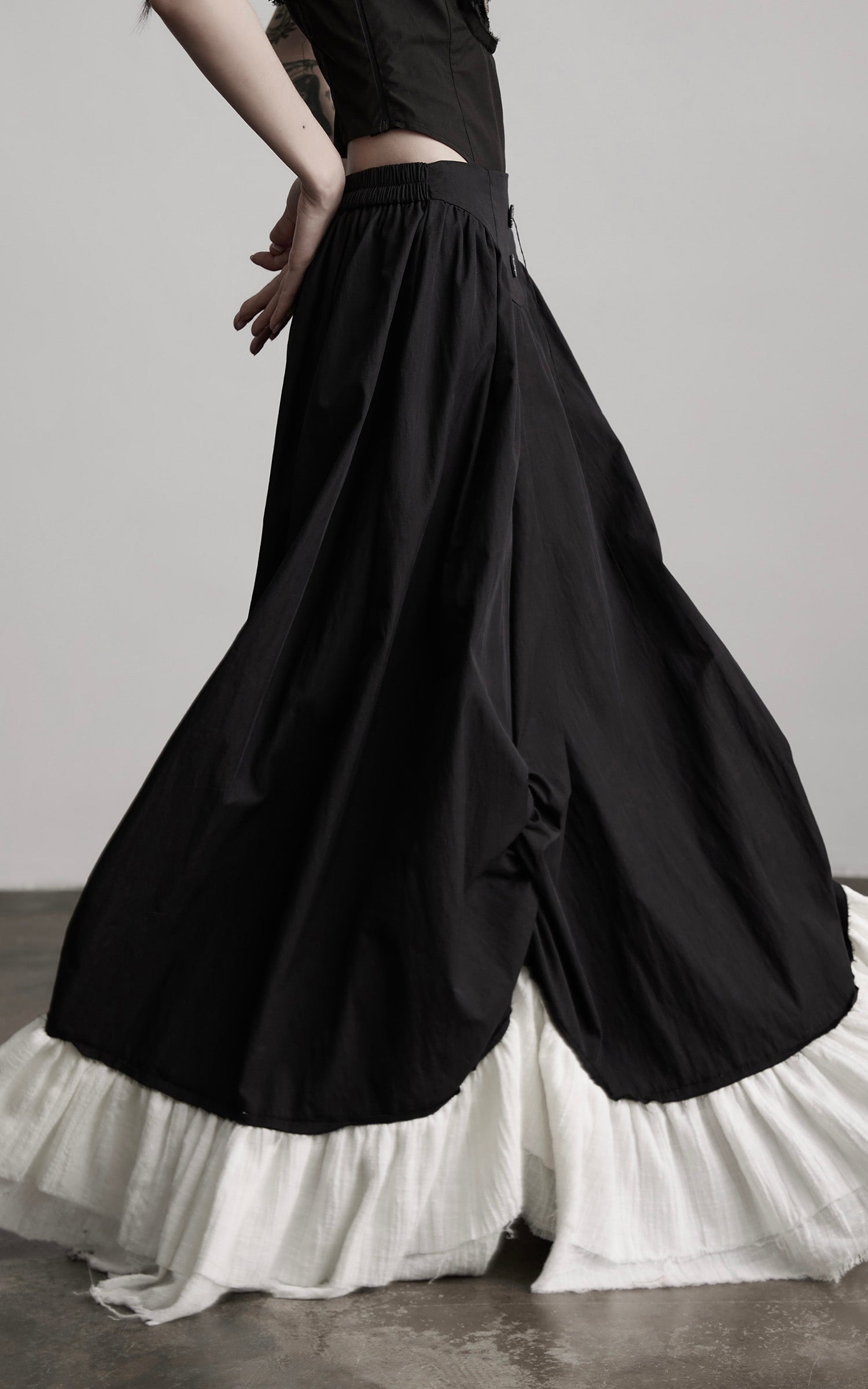 DOINDULGE Layered Contrast Hem Skirt with Gathered Draping and Buttoned High Waist