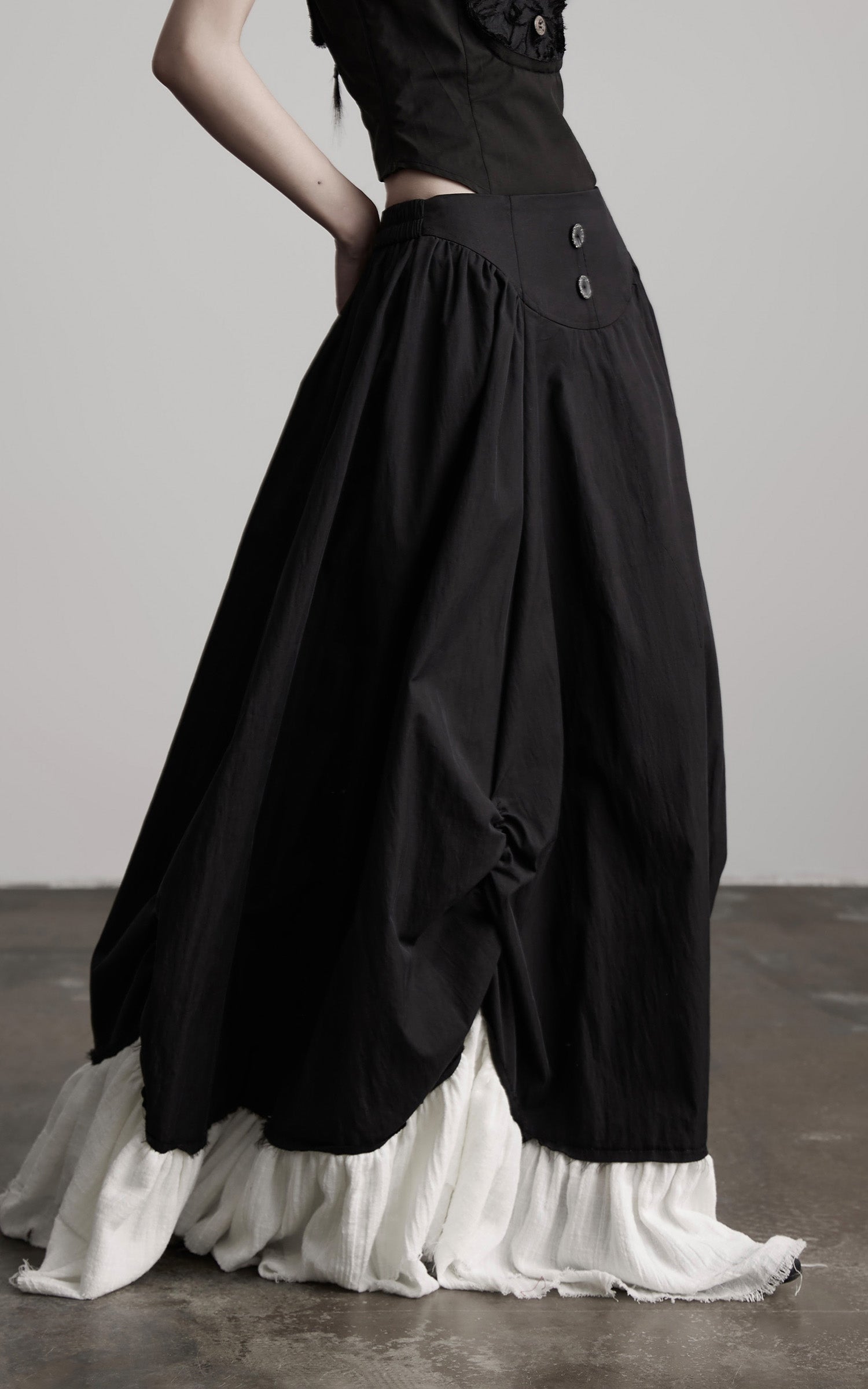 DOINDULGE Layered Contrast Hem Skirt with Gathered Draping and Buttoned High Waist