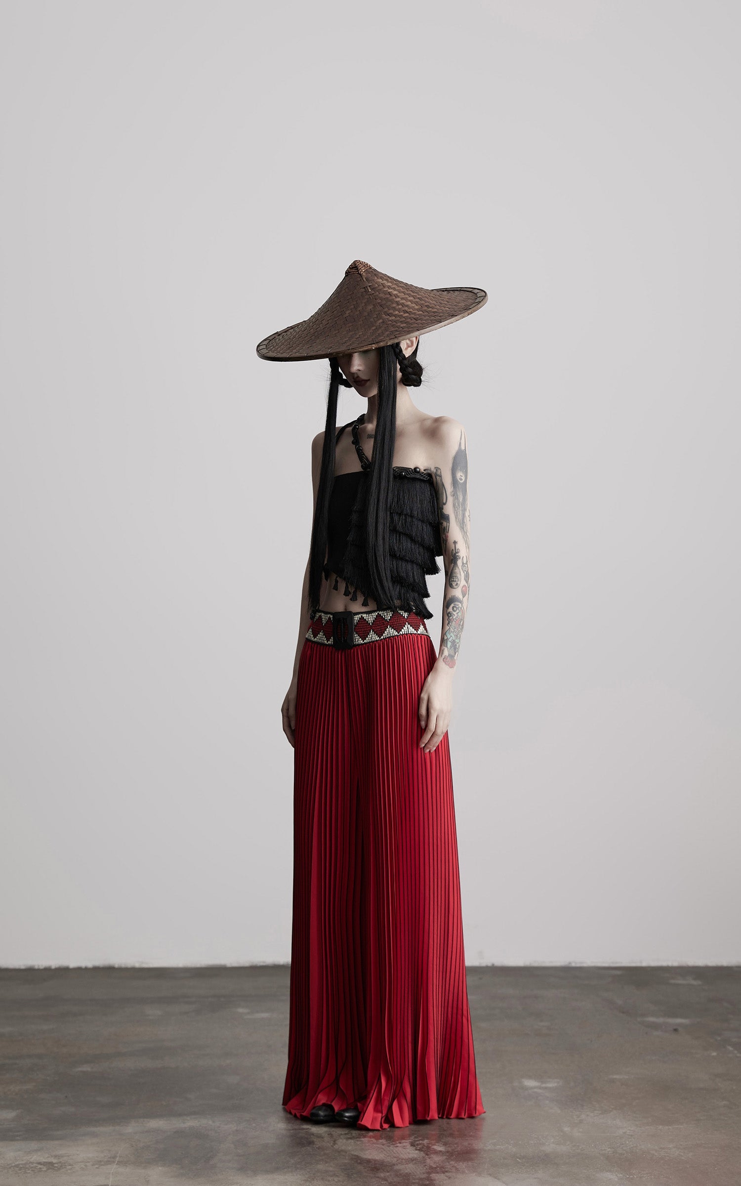 DOINDULGE Red Pleated Wide-Leg Skirt with Geometric Woven Waistband and Statement Buckle