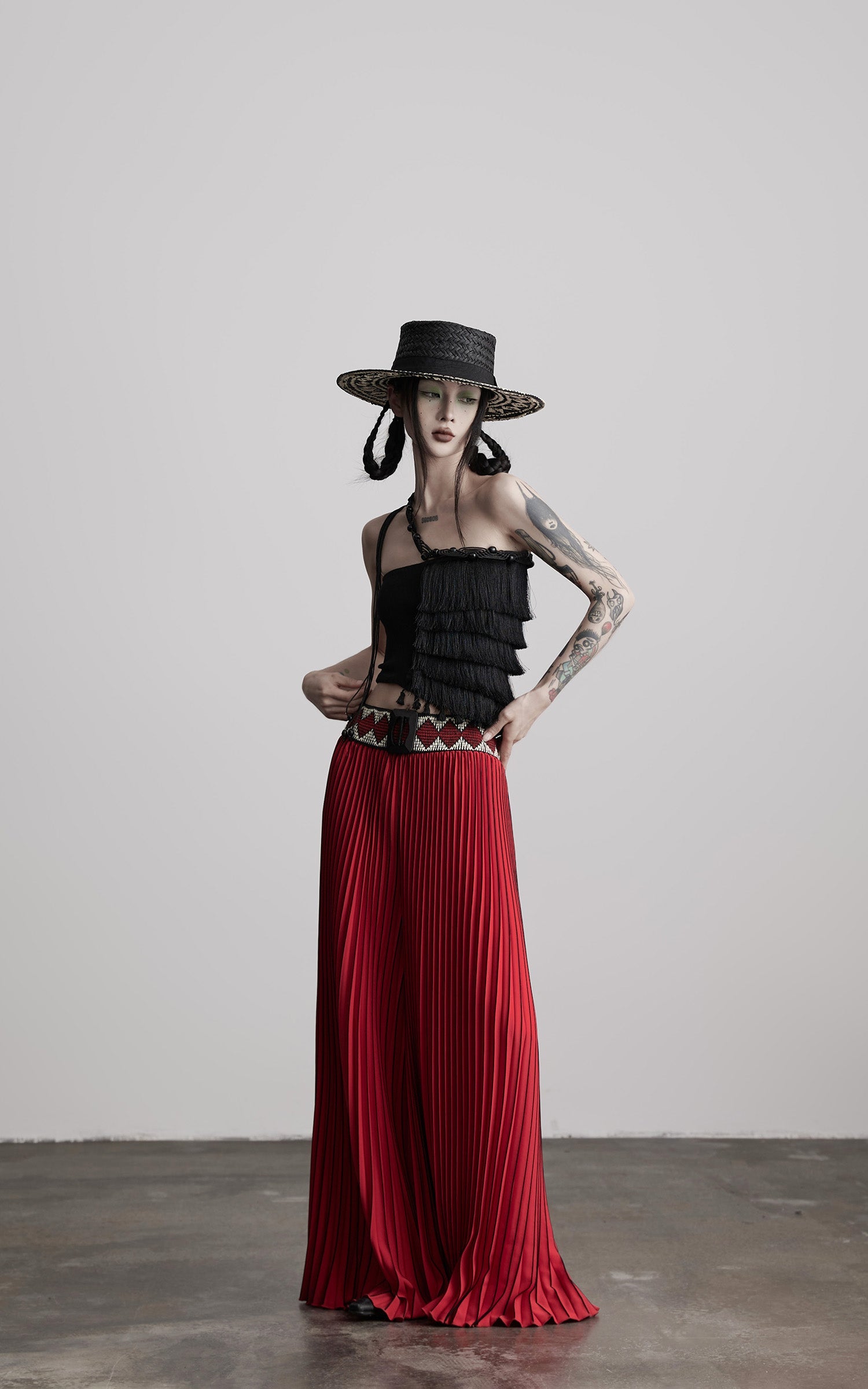 DOINDULGE Red Pleated Wide-Leg Skirt with Geometric Woven Waistband and Statement Buckle