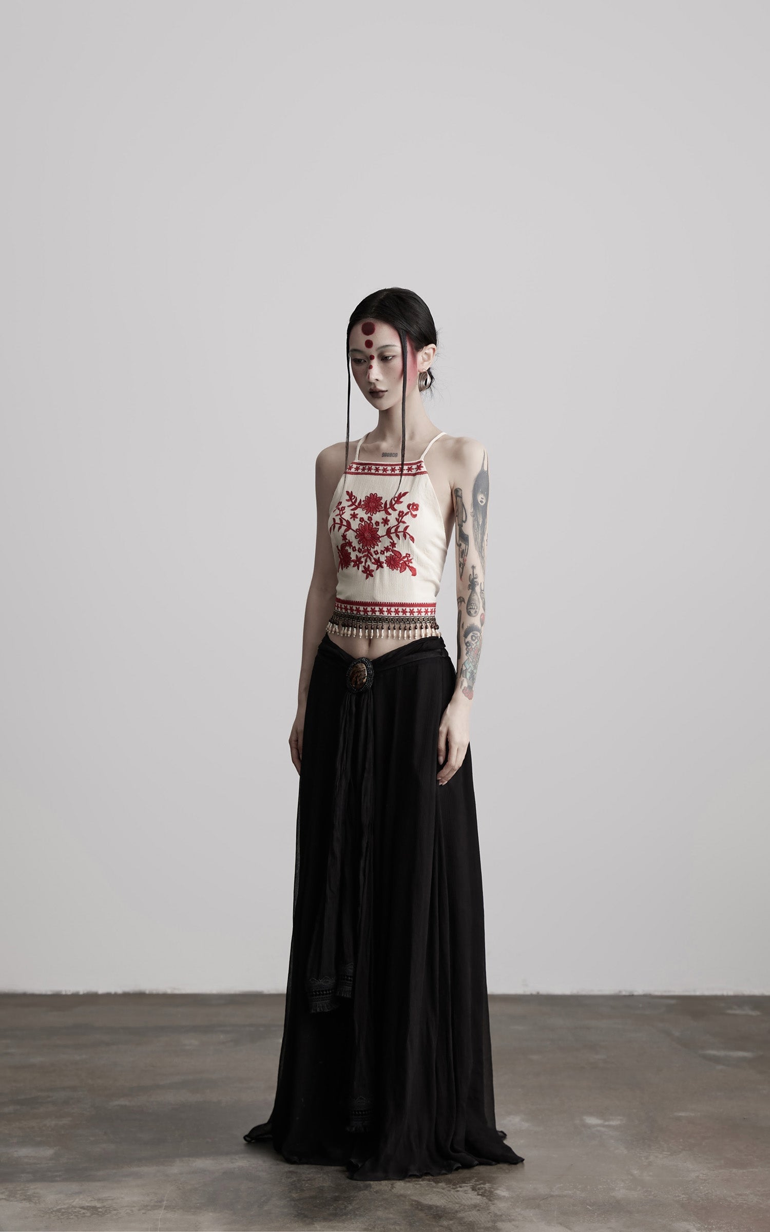 DOINDULGE Embroidered Halter Top with Floral Motif and Beaded Hem Detailing