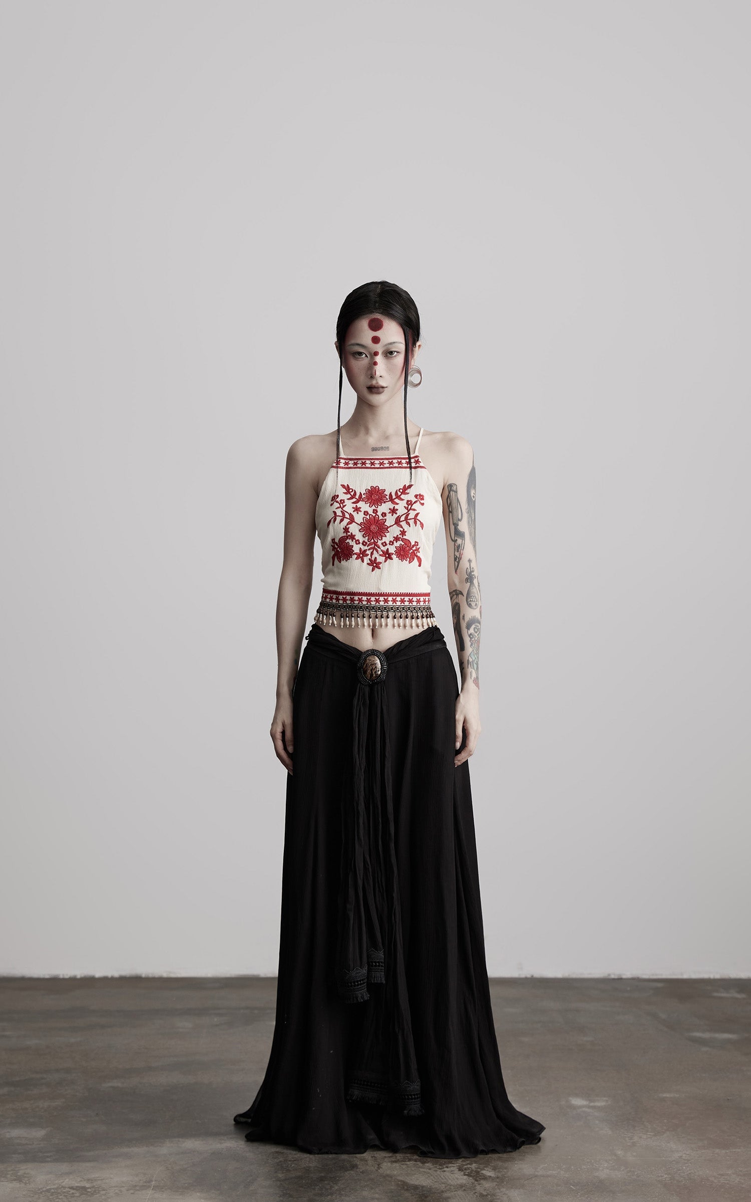 DOINDULGE Embroidered Halter Top with Floral Motif and Beaded Hem Detailing