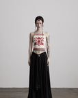 DOINDULGE Embroidered Halter Top with Floral Motif and Beaded Hem Detailing